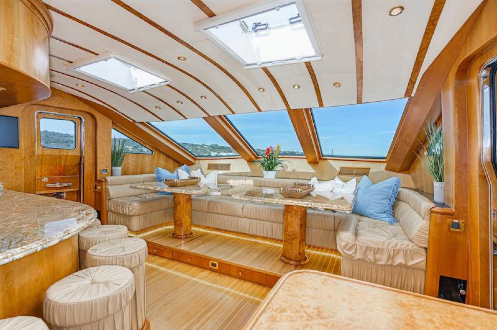a room with a bed and a table aboard ALMOST THERE Yacht for Sale