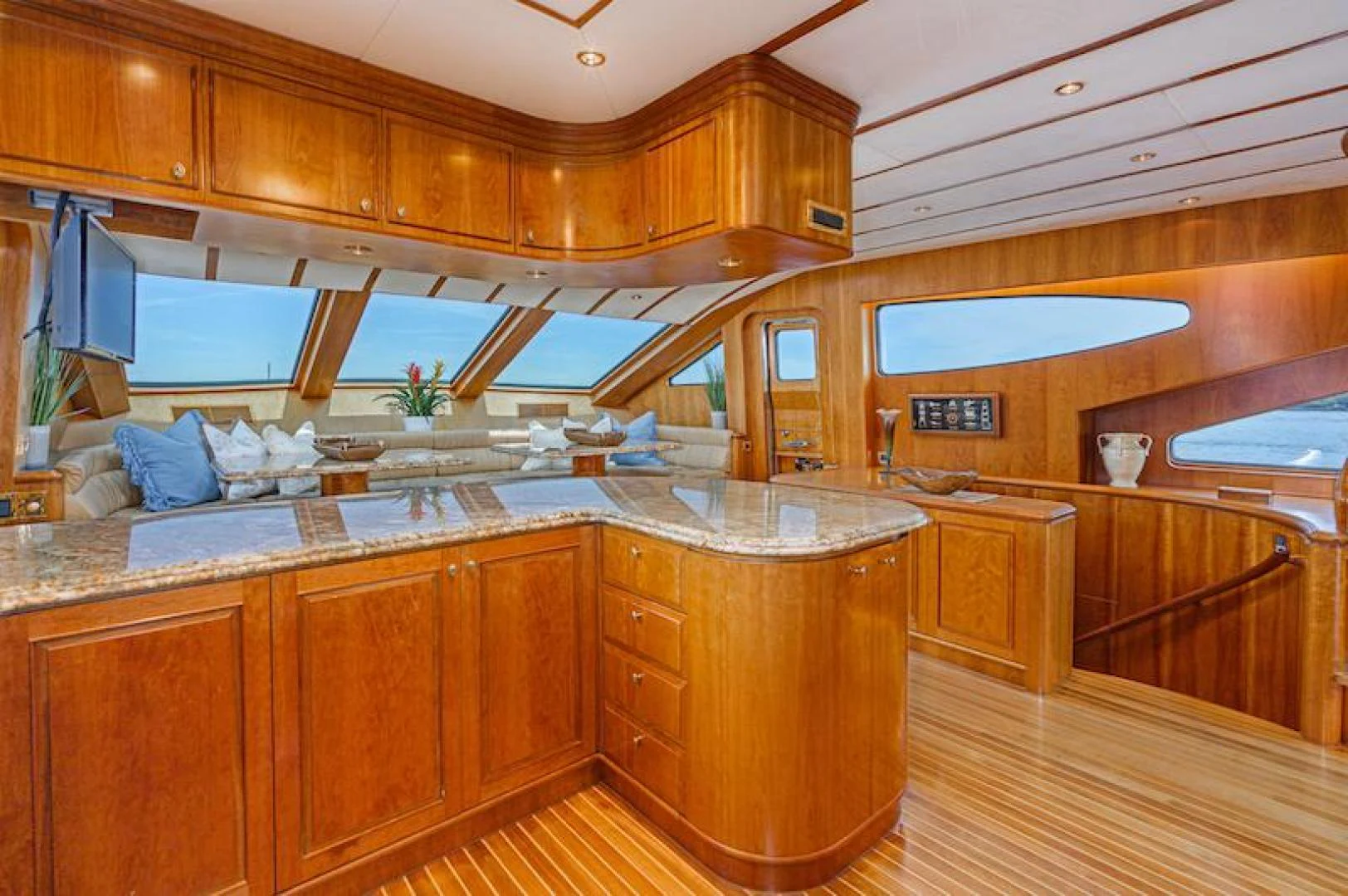 a kitchen with wooden cabinets aboard ALMOST THERE Yacht for Sale