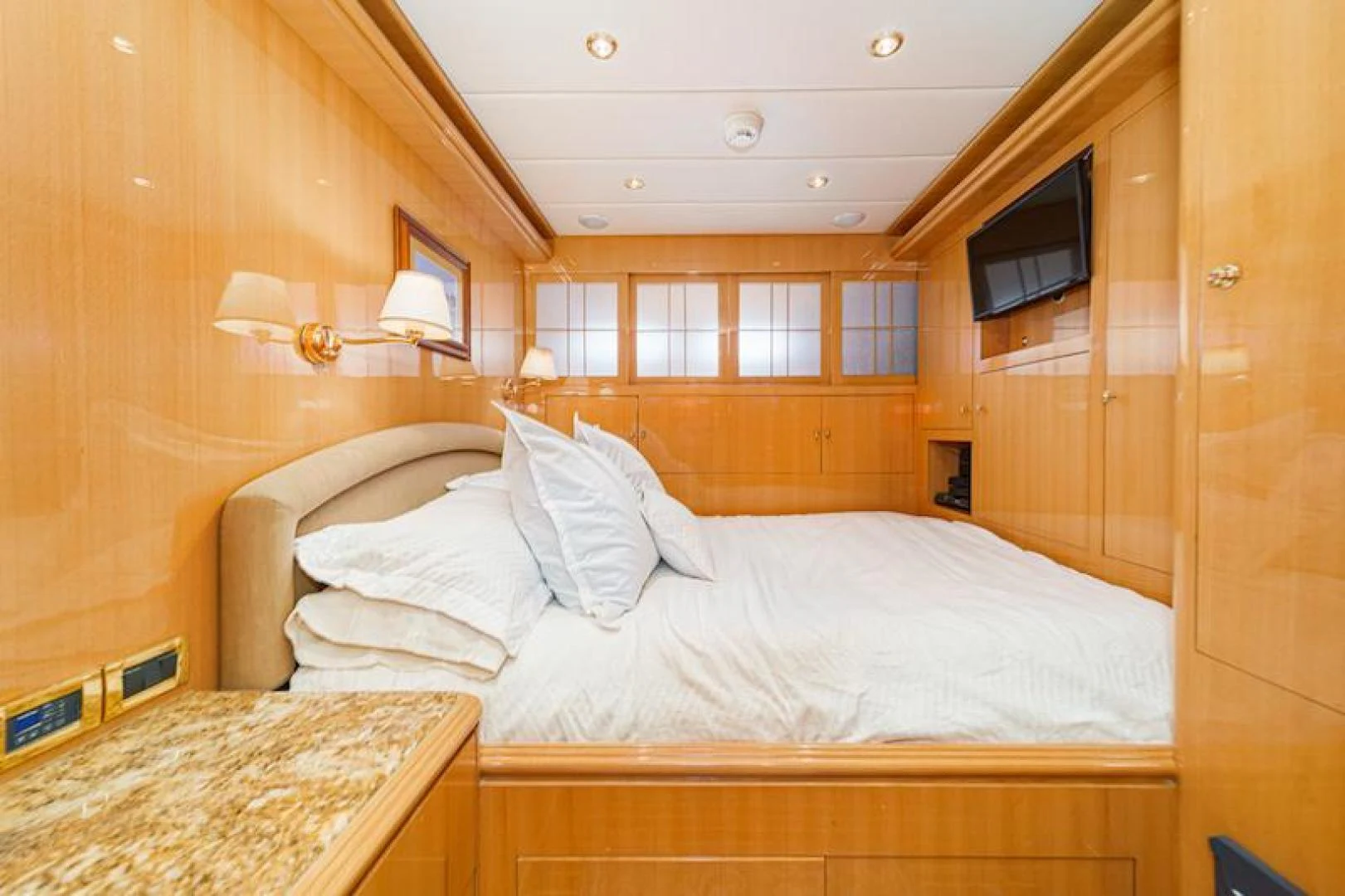 a bed with white sheets aboard ALMOST THERE Yacht for Sale