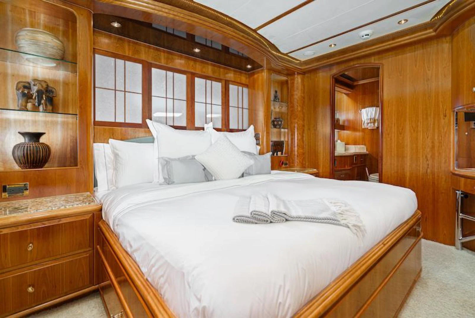 a bed with white sheets aboard ALMOST THERE Yacht for Sale