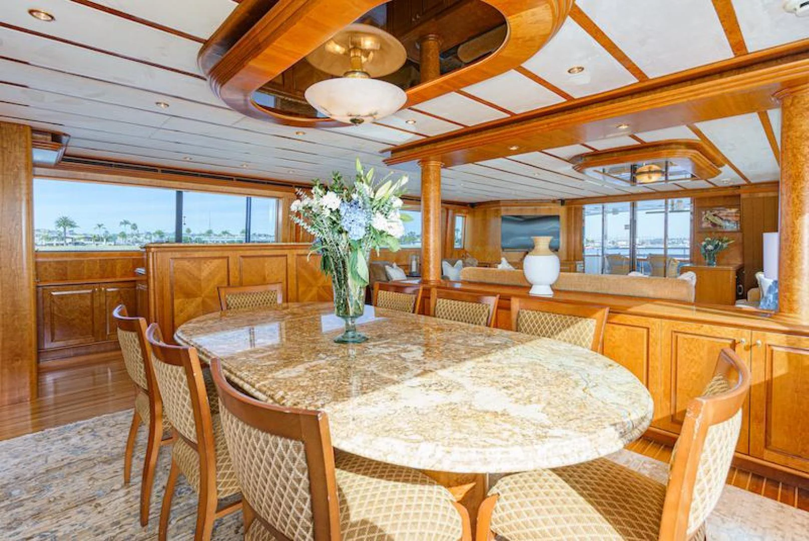 a dining room with a table and chairs aboard ALMOST THERE Yacht for Sale