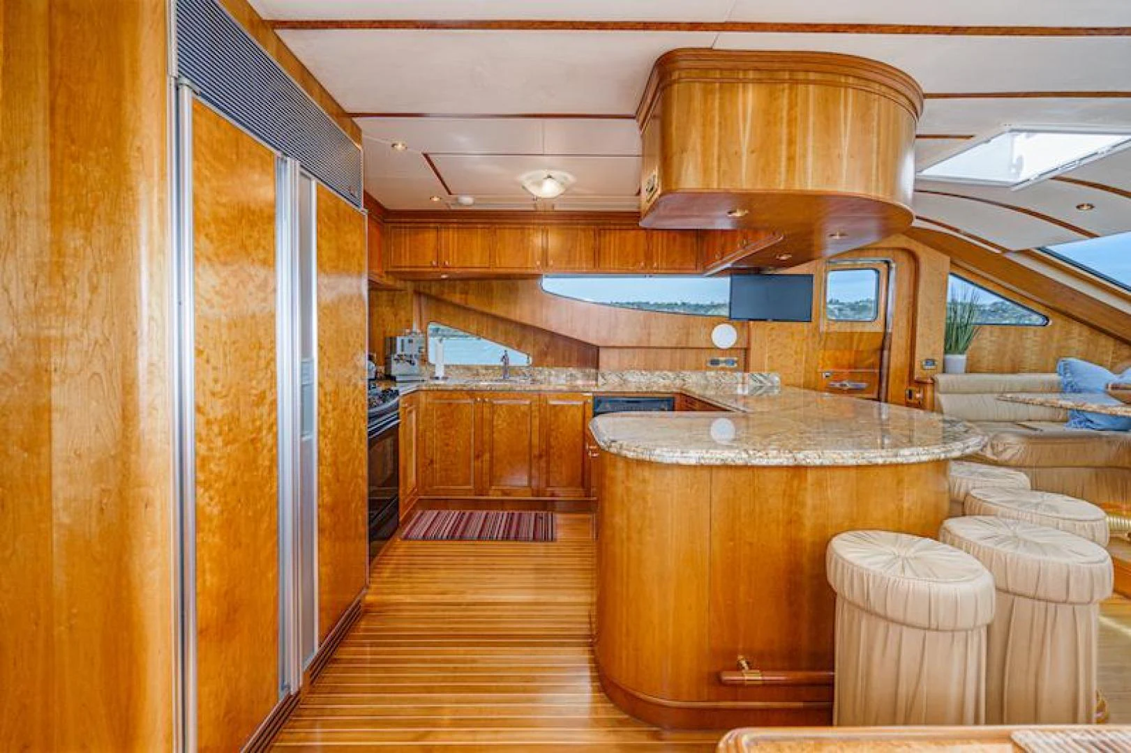 a large kitchen with a large wood stove aboard ALMOST THERE Yacht for Sale