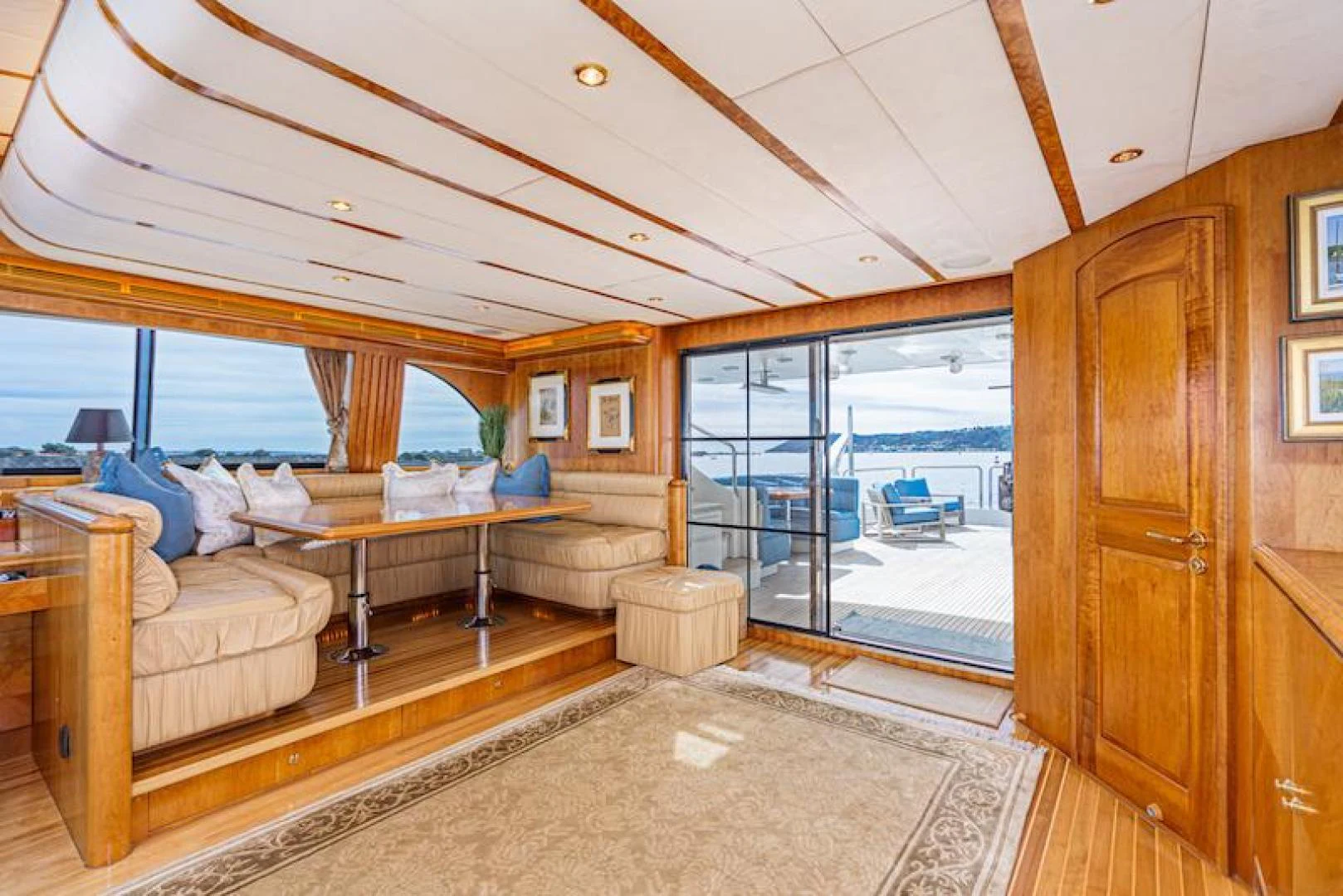 a room with a bed and a large window aboard ALMOST THERE Yacht for Sale