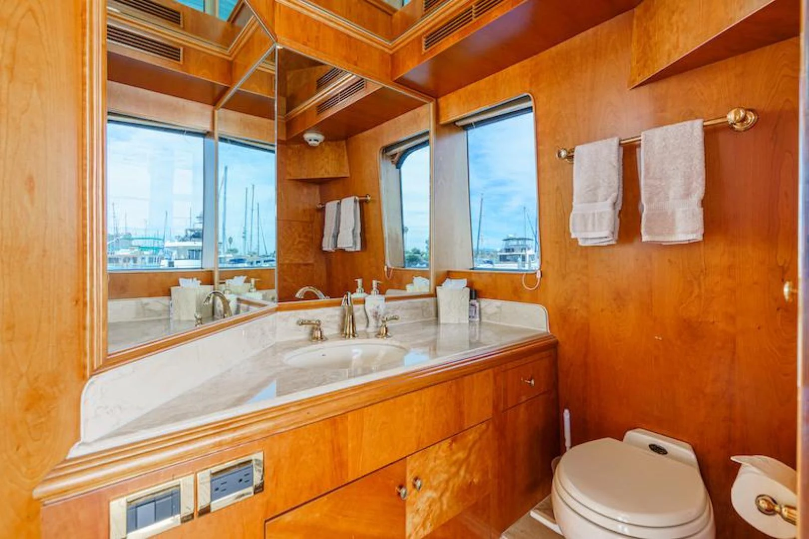 a bathroom with a sink and a toilet aboard ALMOST THERE Yacht for Sale