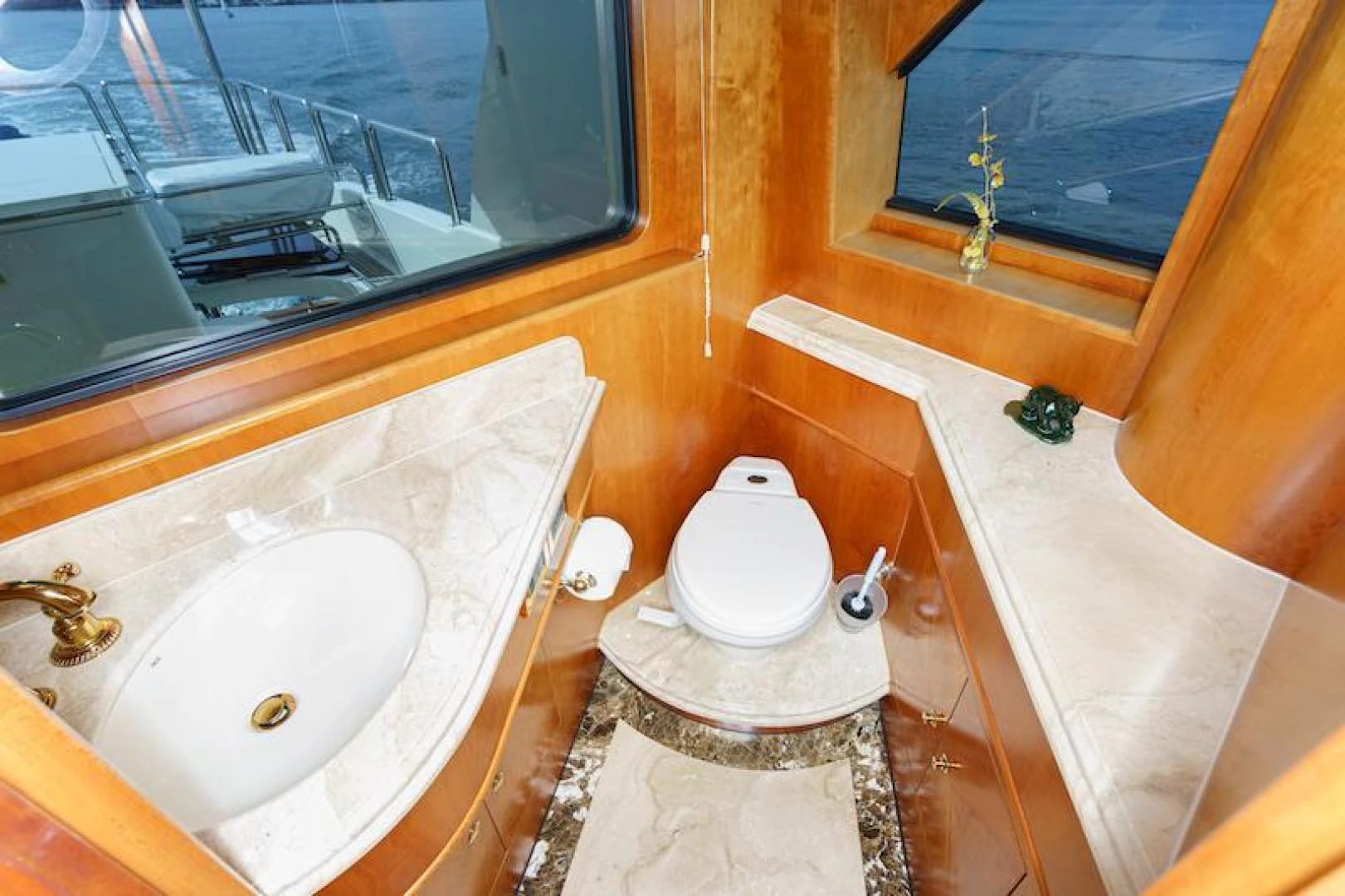 a bathroom with a sink toilet and a bathtub aboard ALMOST THERE Yacht for Sale