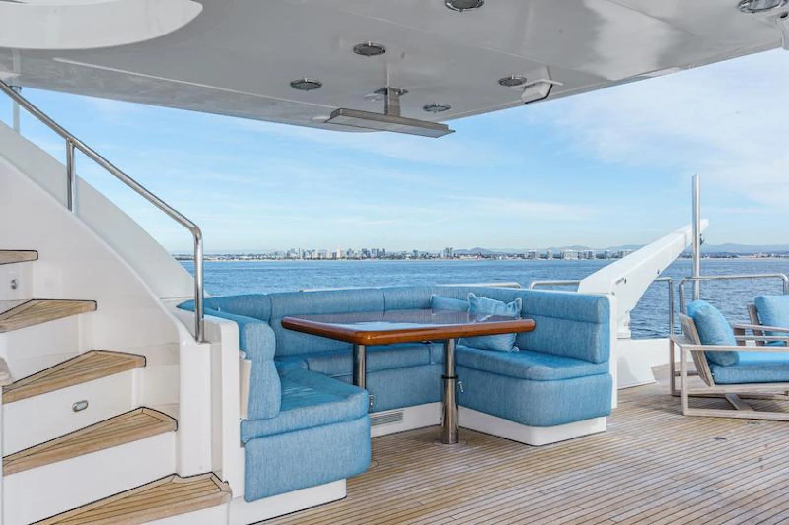 a pool with a table and chairs aboard ALMOST THERE Yacht for Sale