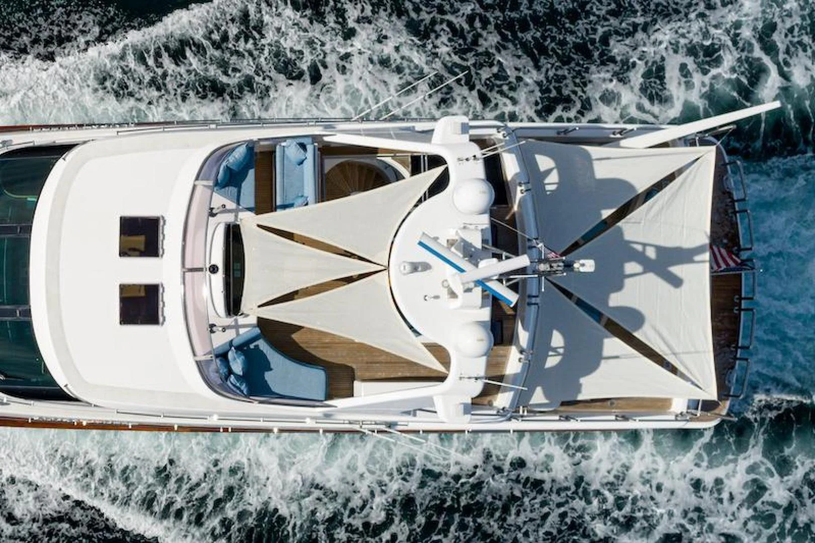a helicopter on a dock aboard ALMOST THERE Yacht for Sale