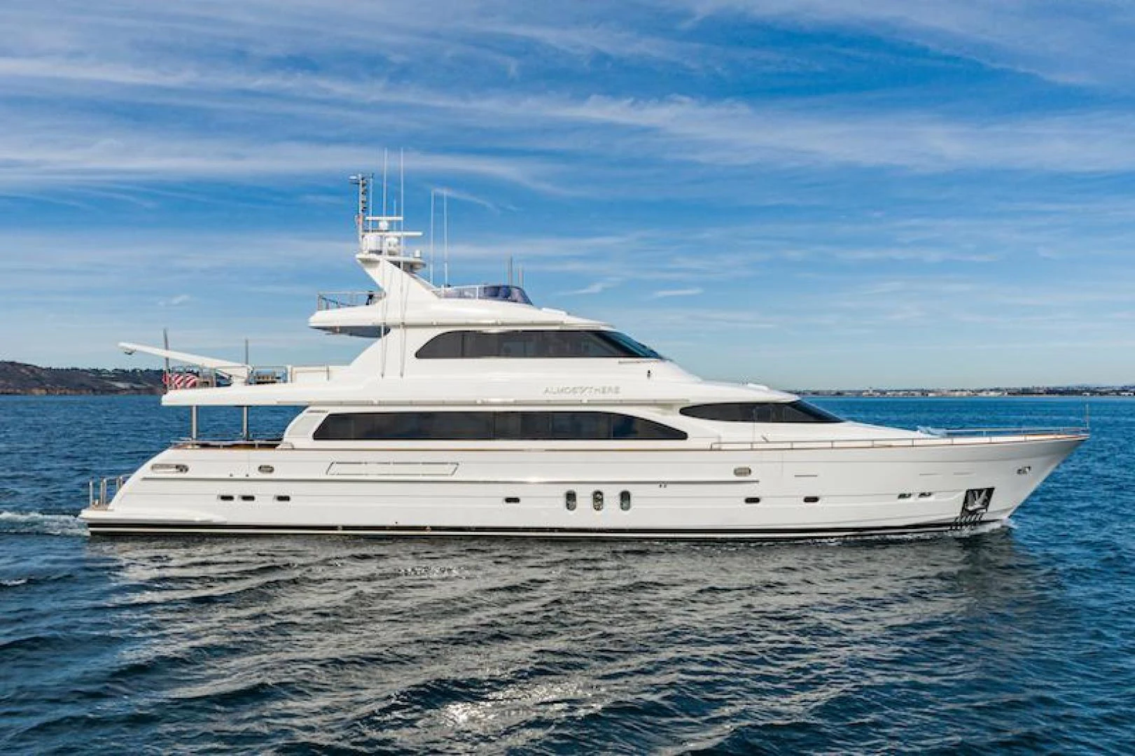 a white yacht in the water aboard ALMOST THERE Yacht for Sale