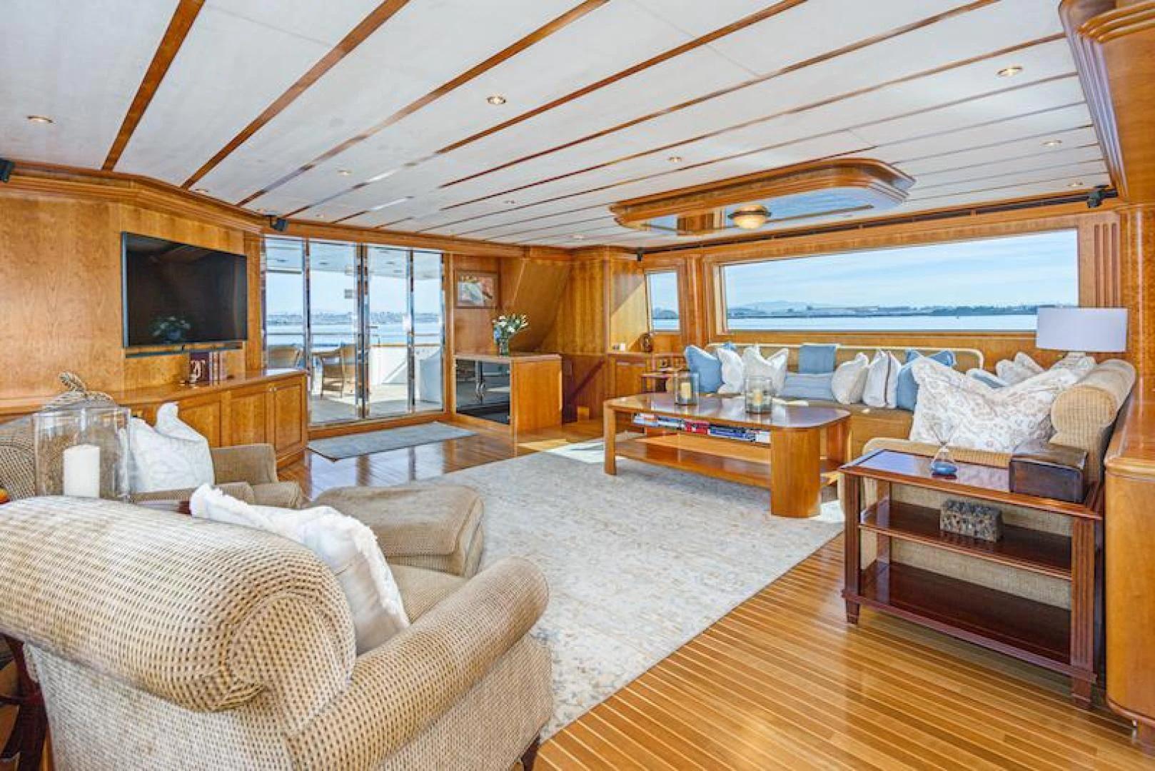 a living room with a large window aboard ALMOST THERE Yacht for Sale