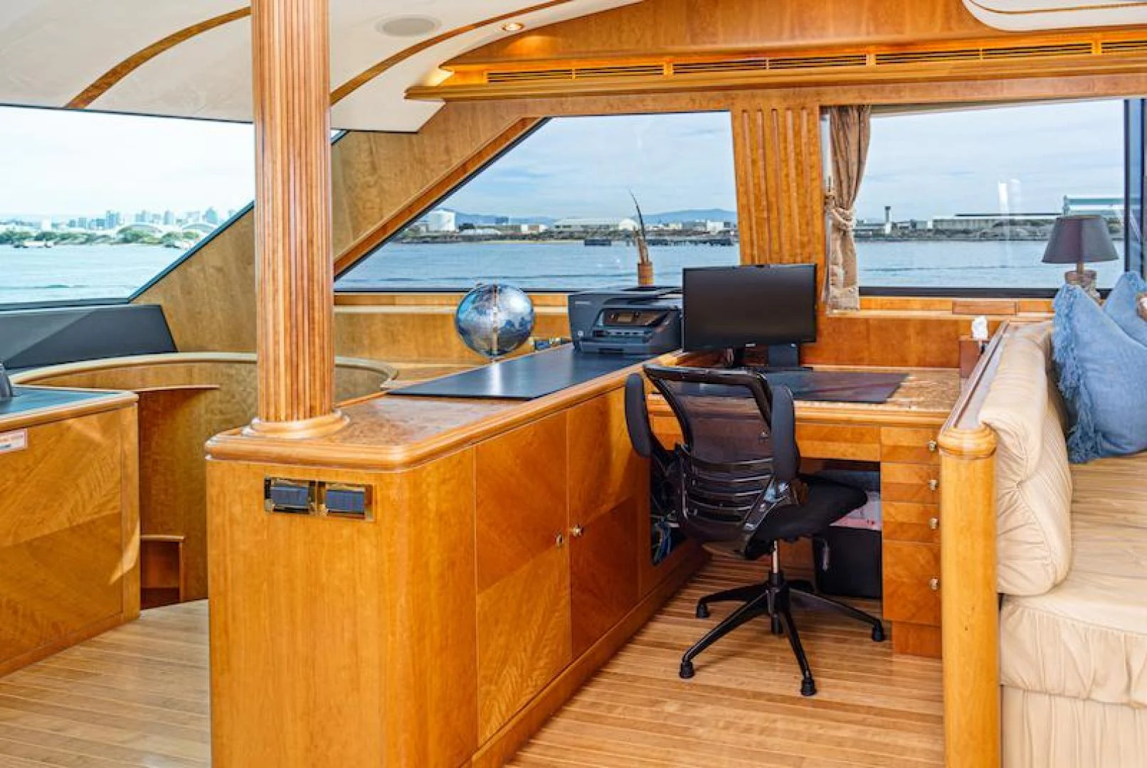 a room with a desk and a couch aboard ALMOST THERE Yacht for Sale