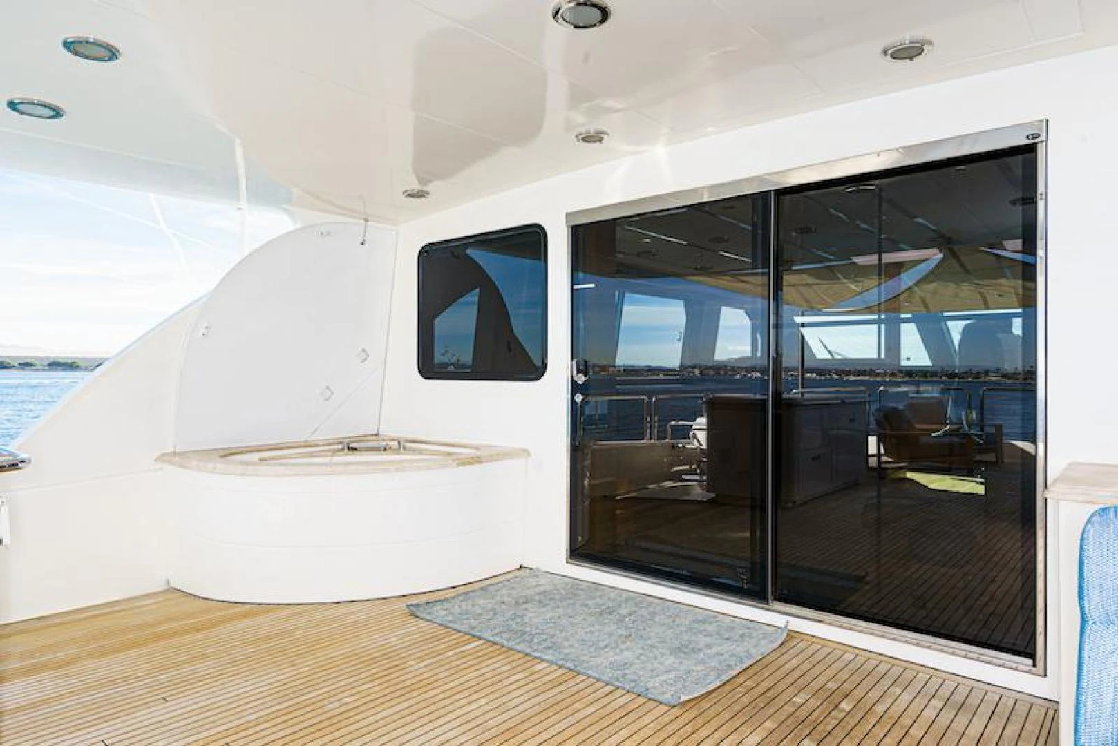 a boat with a glass door aboard ALMOST THERE Yacht for Sale