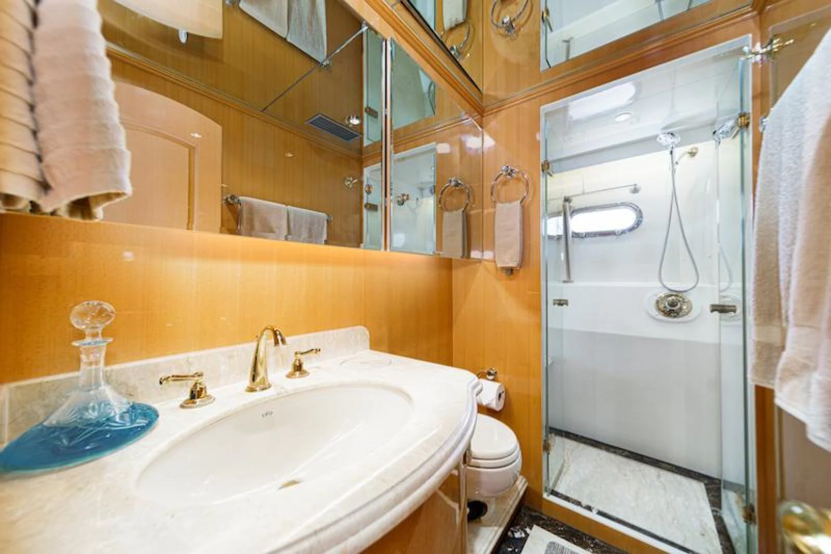 a bathroom with a sink and shower aboard ALMOST THERE Yacht for Sale