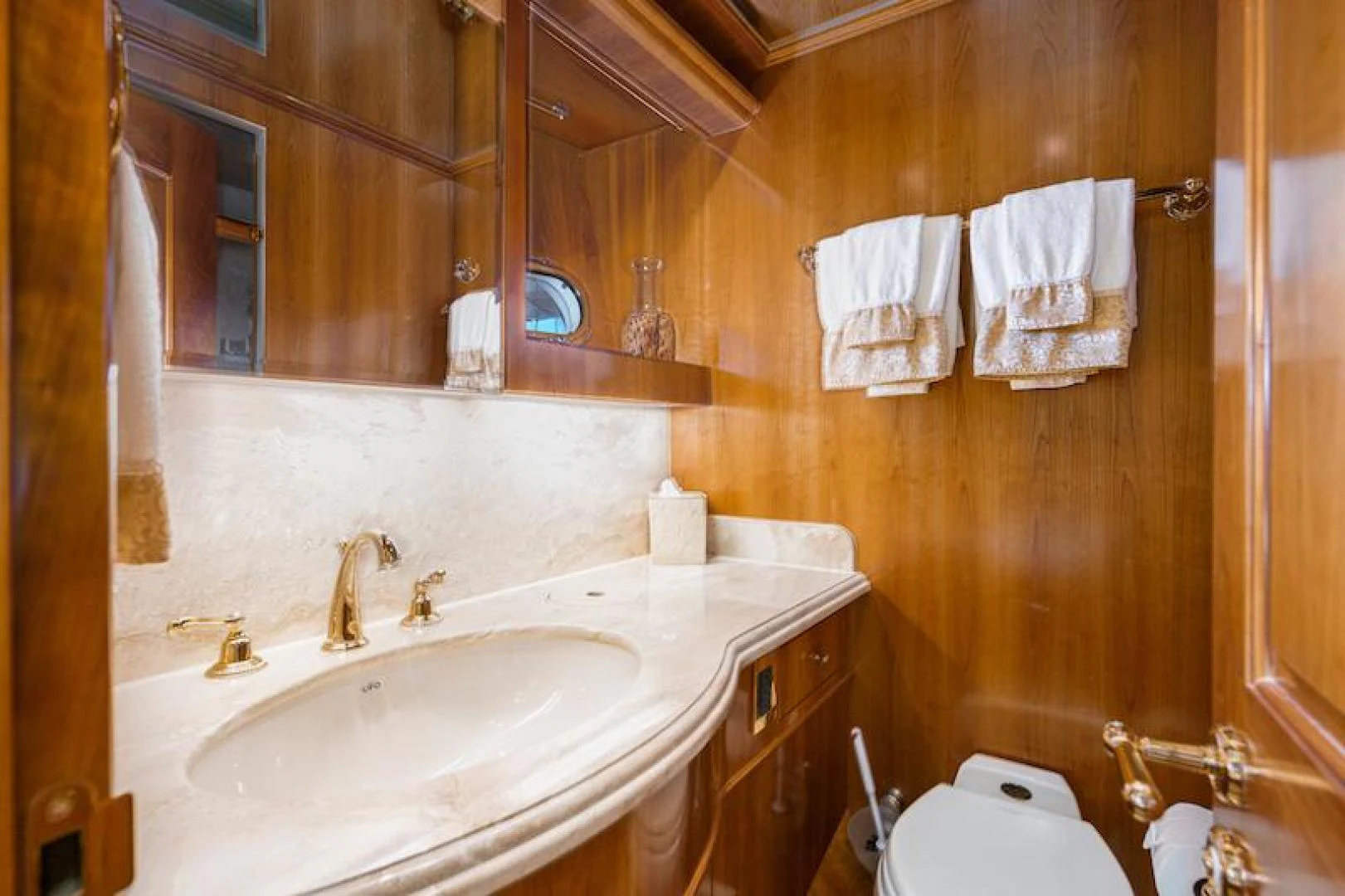 a bathroom with a sink and toilet aboard ALMOST THERE Yacht for Sale