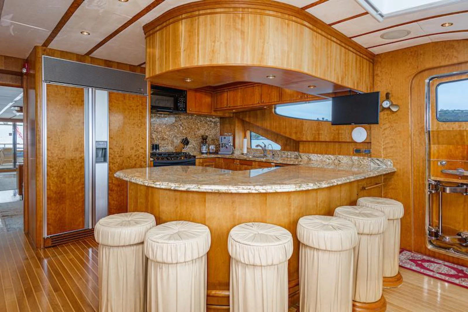a kitchen with a large wooden stove aboard ALMOST THERE Yacht for Sale