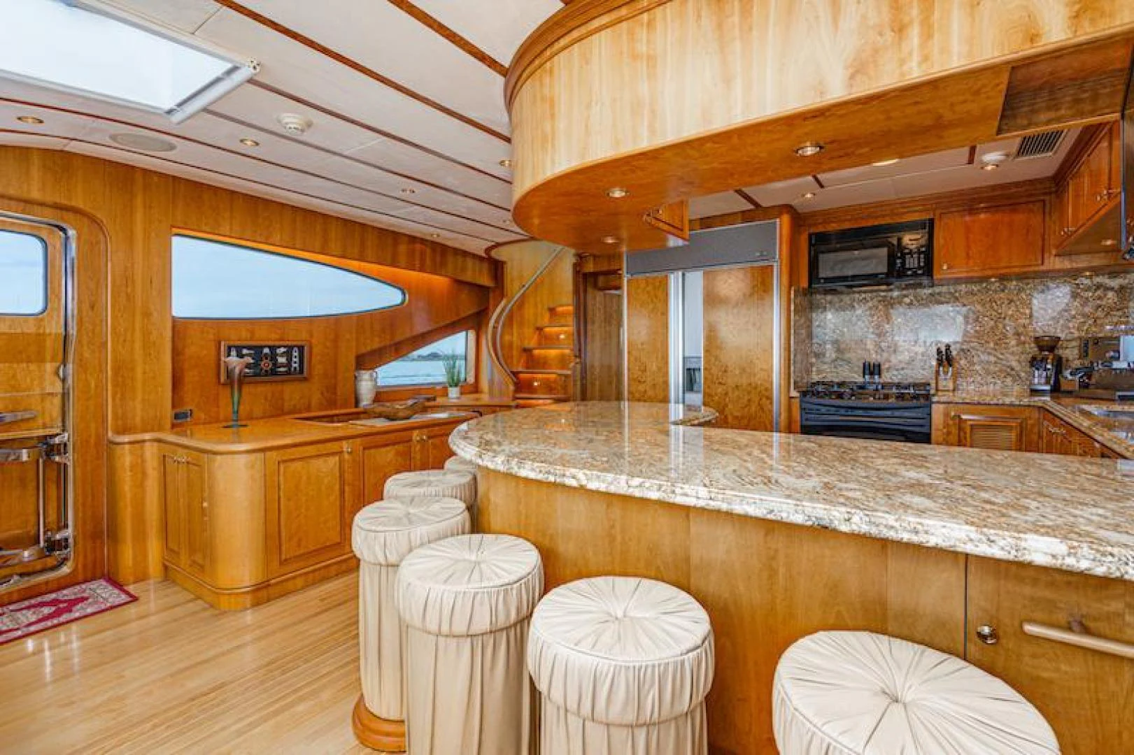 a large kitchen with marble counters aboard ALMOST THERE Yacht for Sale