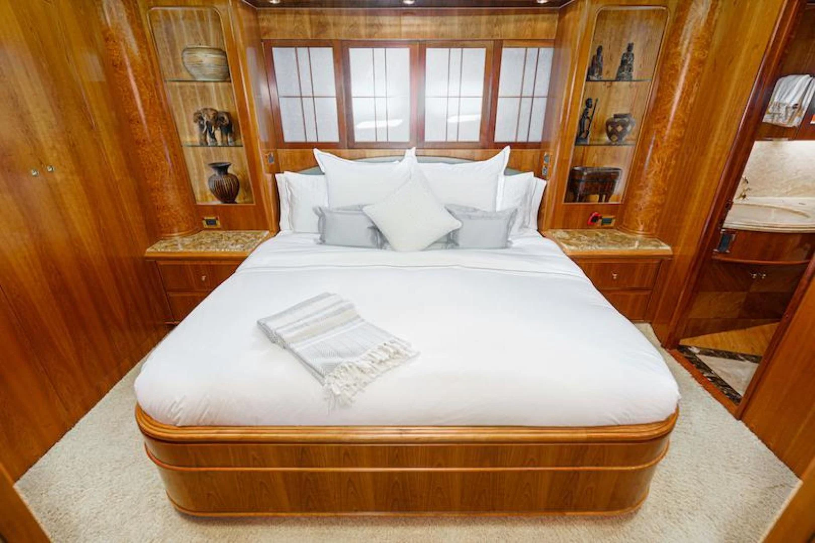 a bed with white sheets aboard ALMOST THERE Yacht for Sale