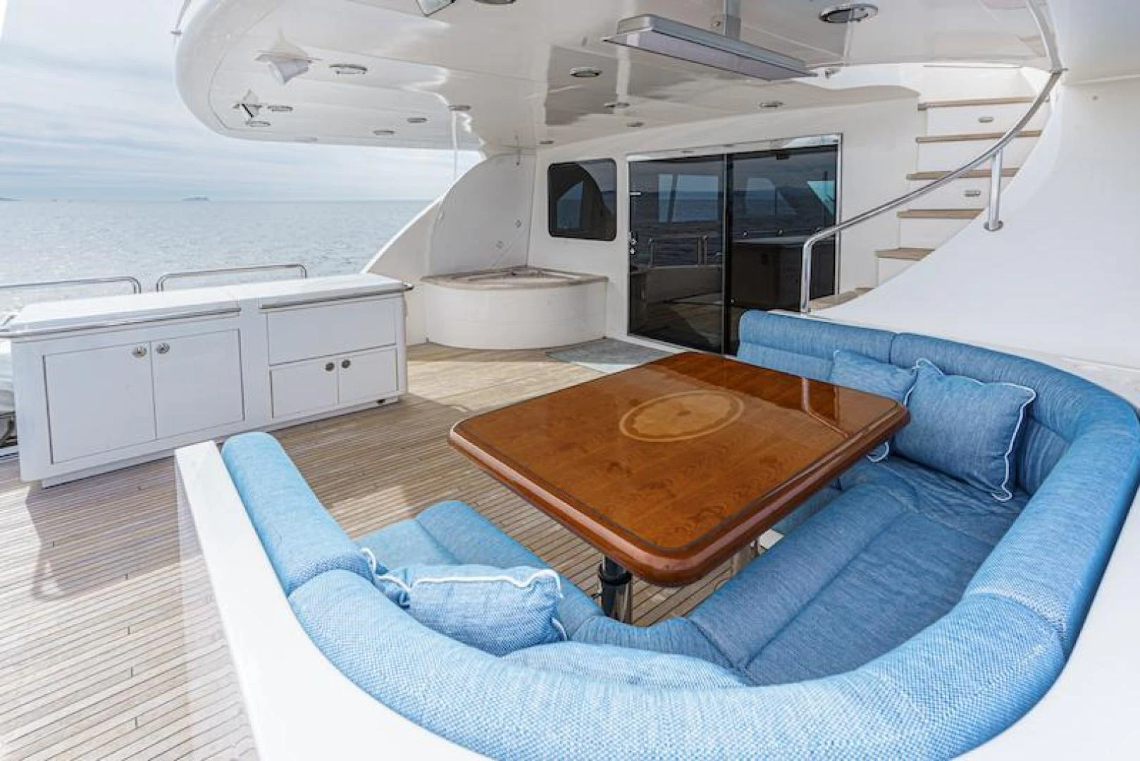 a room with a table and a couch aboard ALMOST THERE Yacht for Sale