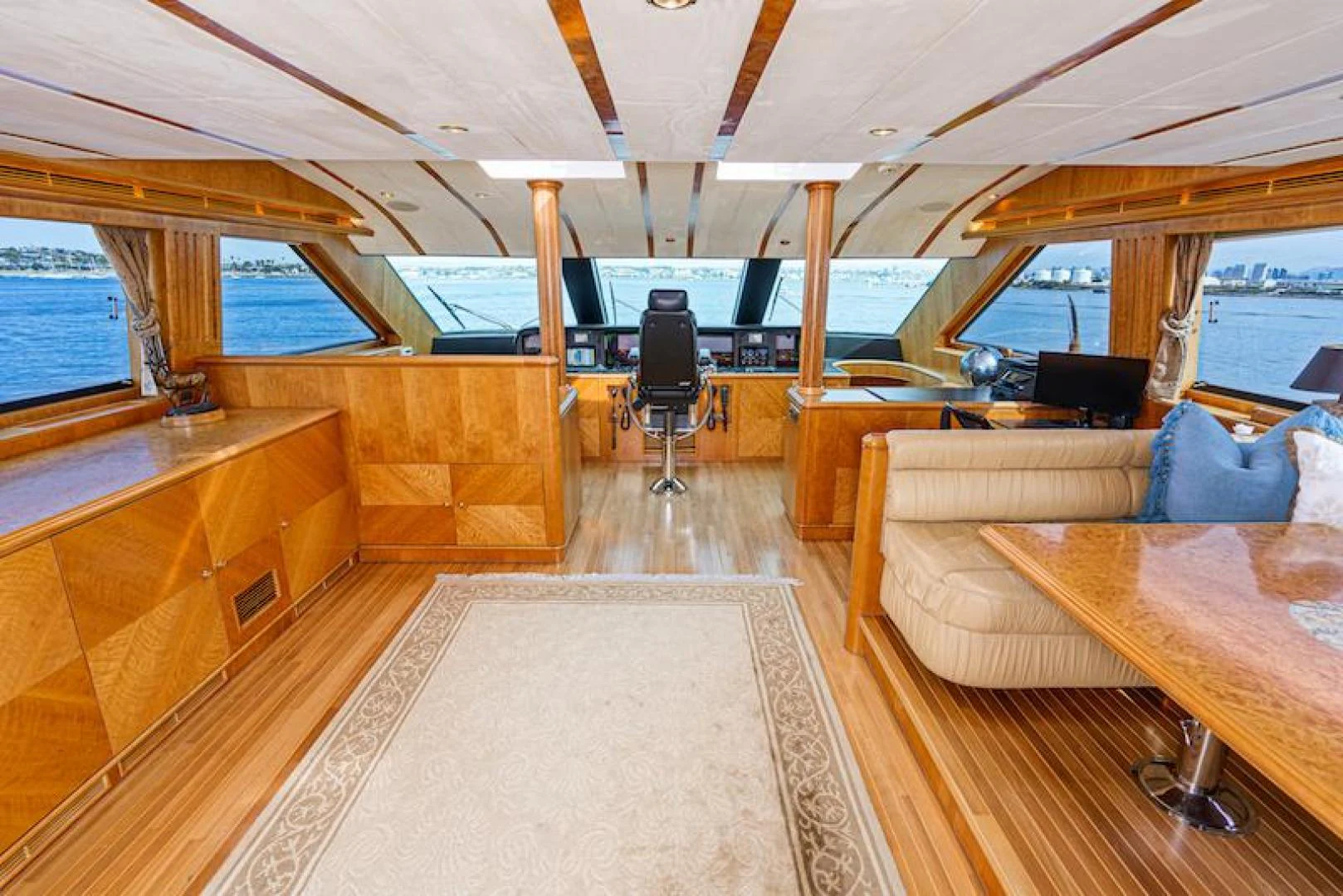 a room with couches and a tv aboard ALMOST THERE Yacht for Sale