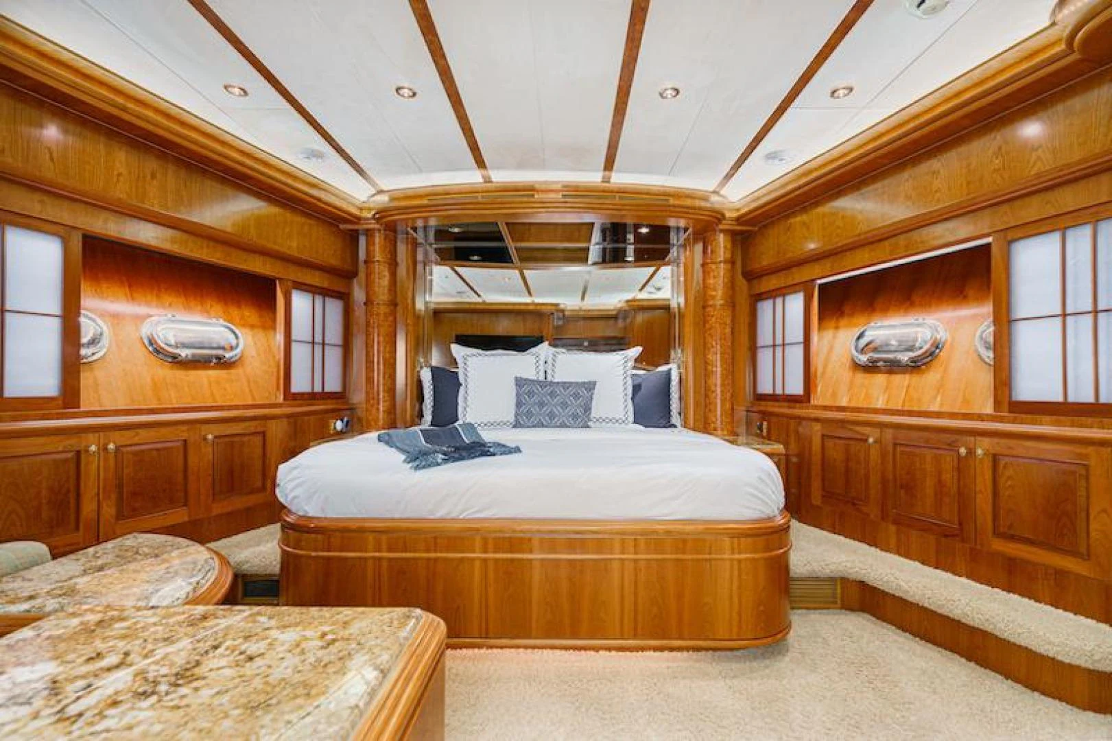 a room with a bed and a table aboard ALMOST THERE Yacht for Sale