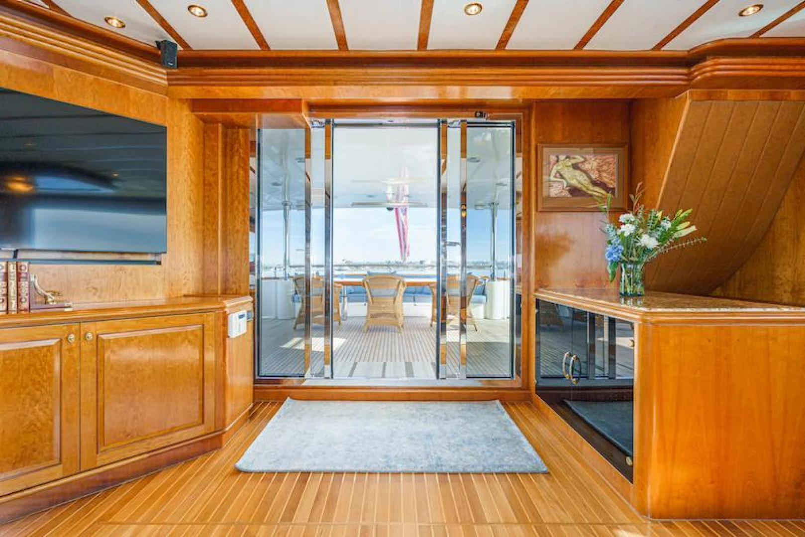 a room with a large glass door aboard ALMOST THERE Yacht for Sale