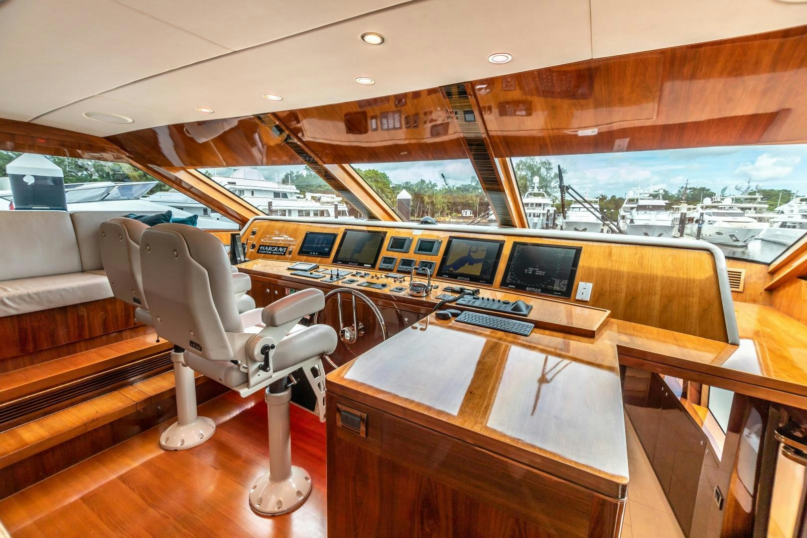 a room with a desk and a chair aboard CUTTING EDGE Yacht for Sale