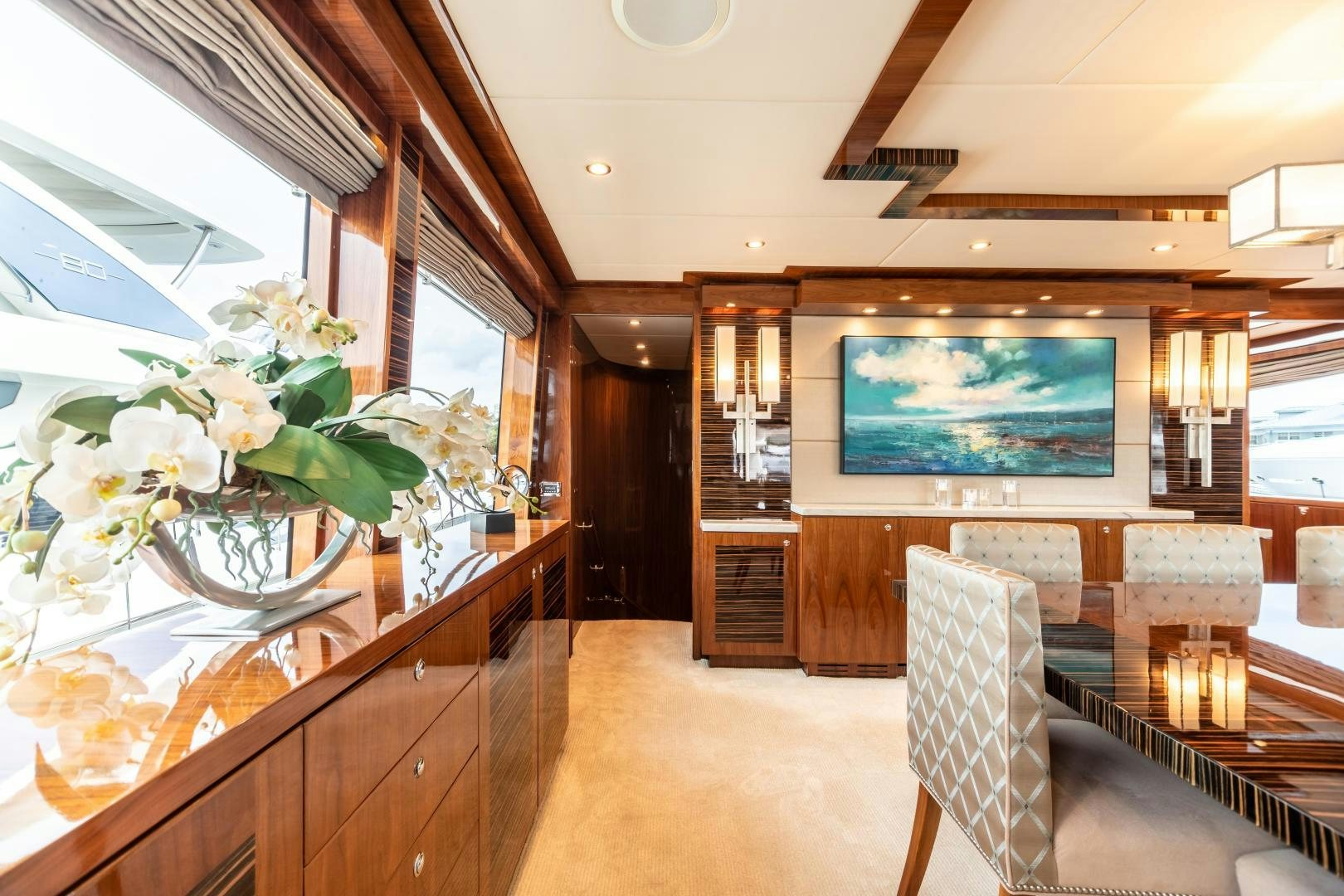 a room with a large screen aboard CUTTING EDGE Yacht for Sale