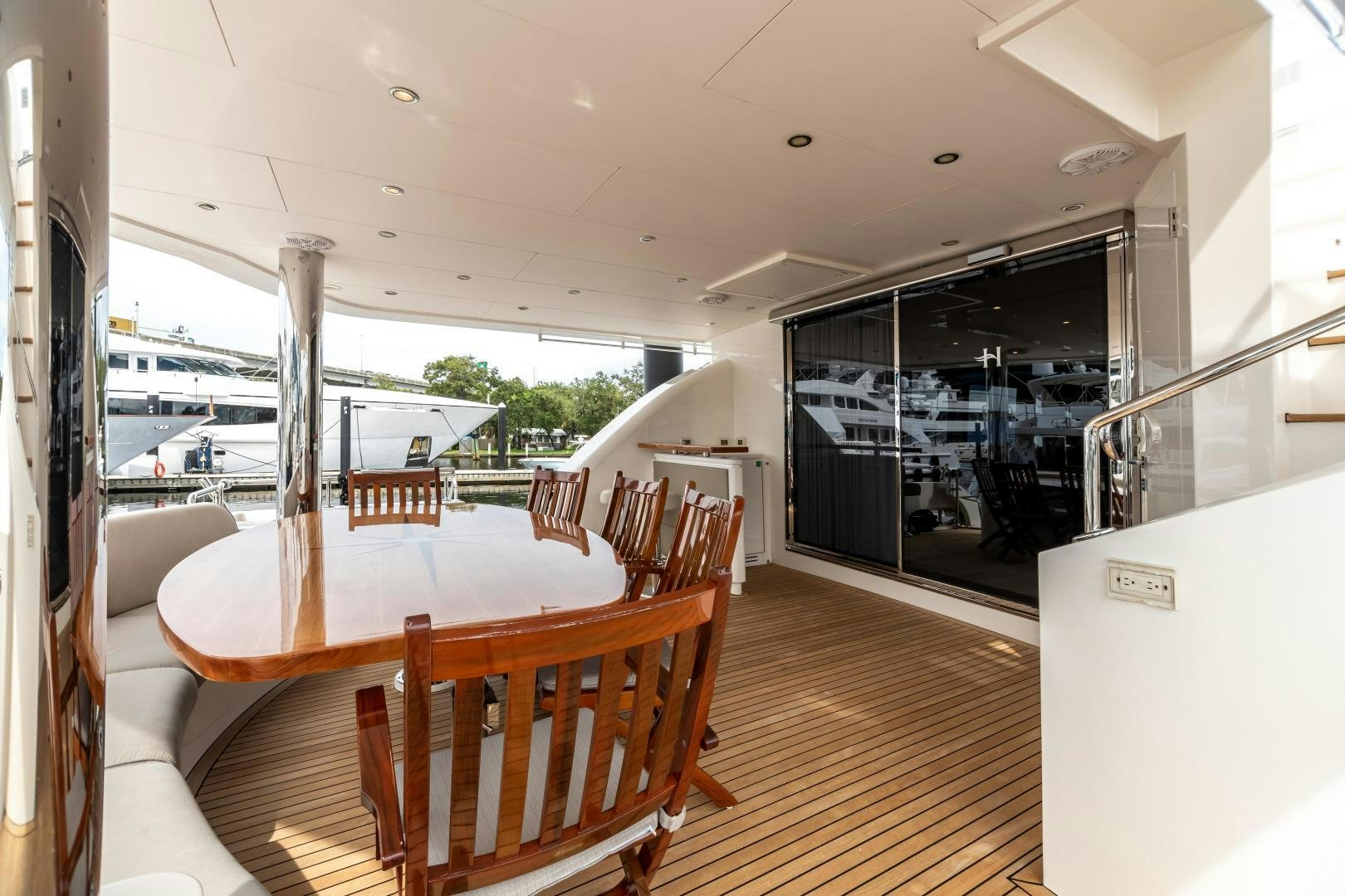 a dining table in a room aboard CUTTING EDGE Yacht for Sale