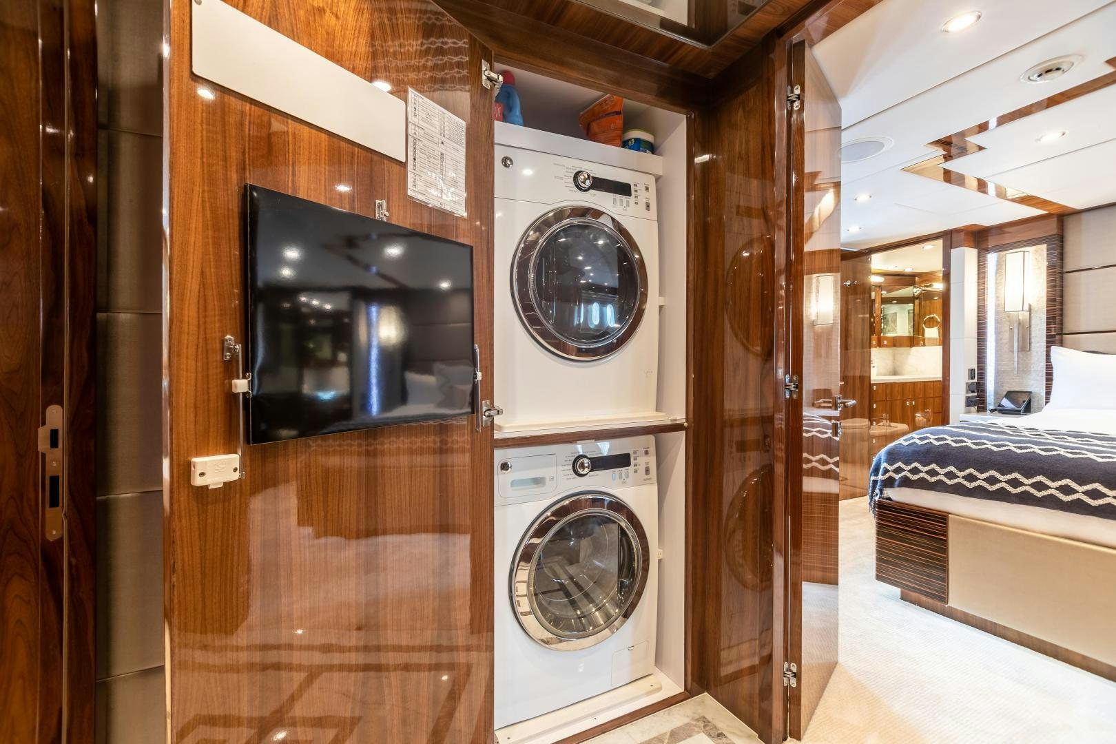 a room with a washer and dryer aboard CUTTING EDGE Yacht for Sale