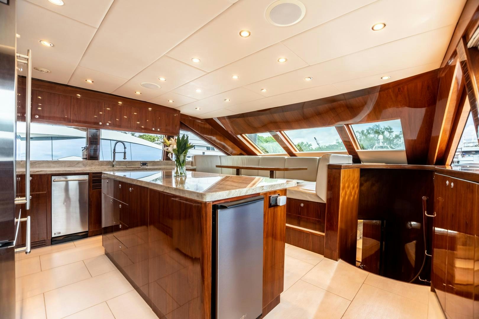a large kitchen with a large island aboard CUTTING EDGE Yacht for Sale