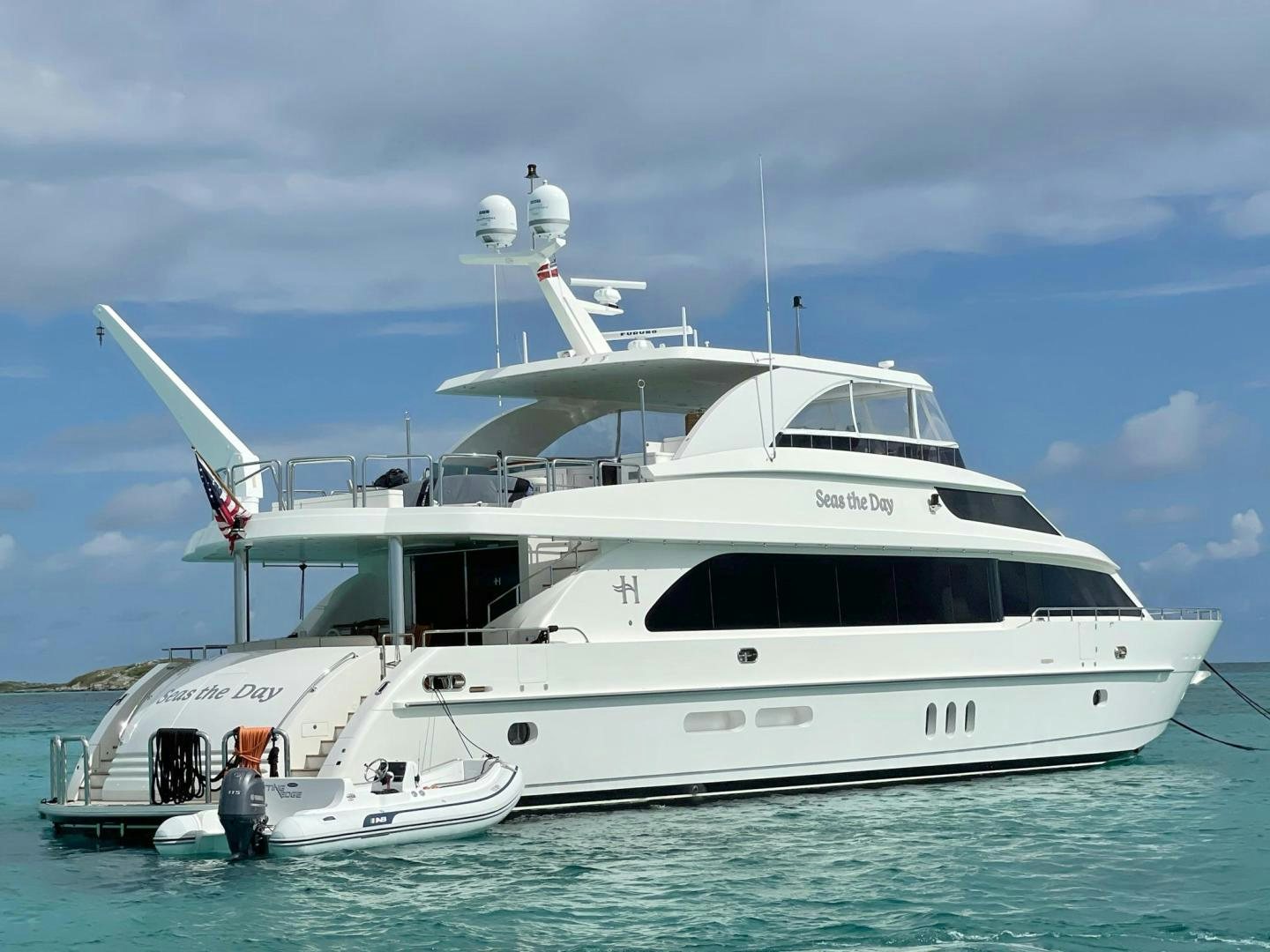 a white yacht in the water aboard CUTTING EDGE Yacht for Sale