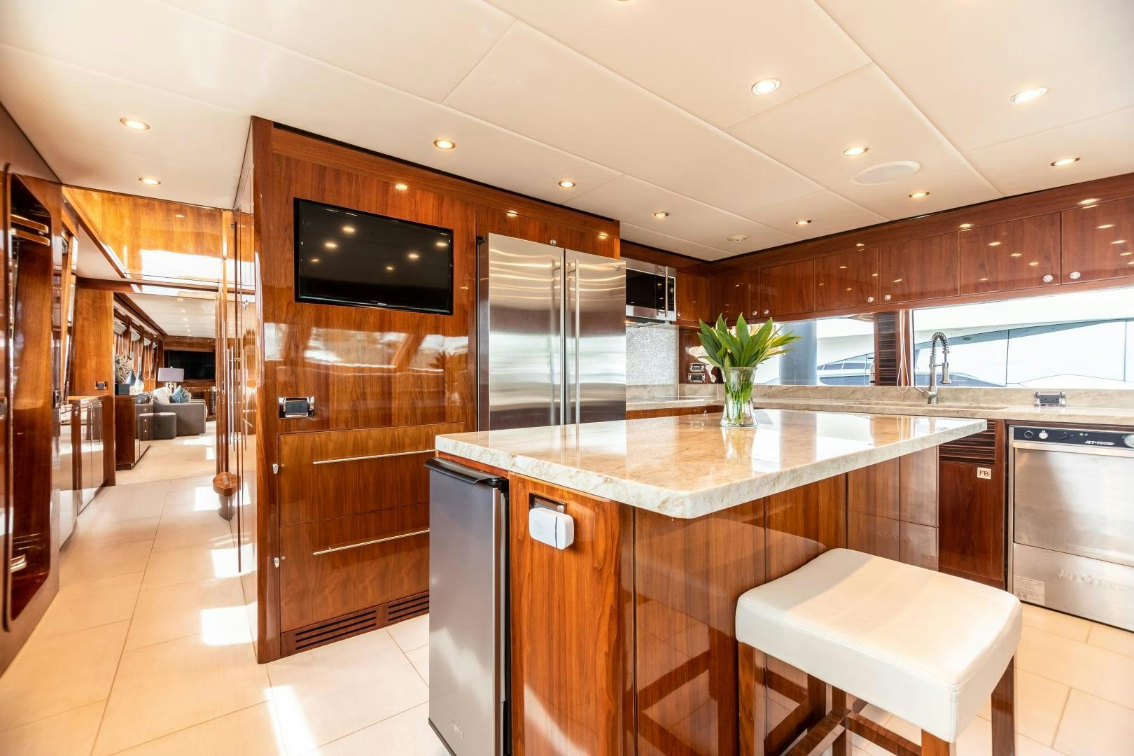 a kitchen with a large island aboard CUTTING EDGE Yacht for Sale