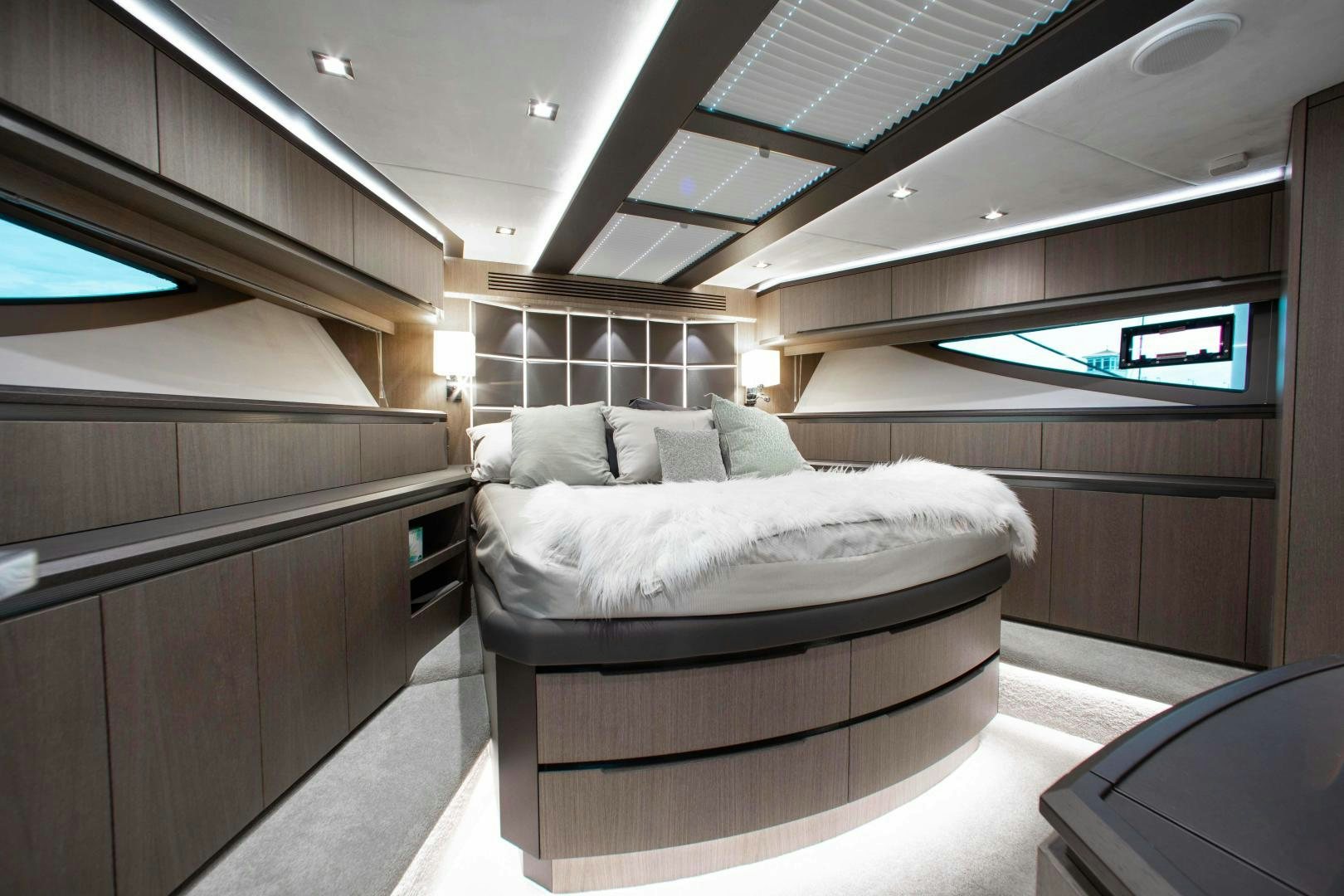 a bed in a room aboard LYLA BEE Yacht for Sale