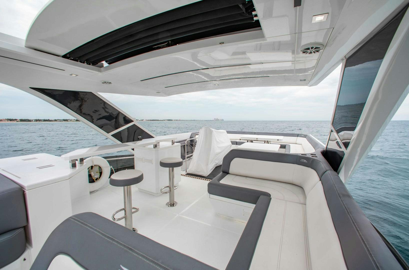a boat with stools and stools on it aboard LYLA BEE Yacht for Sale