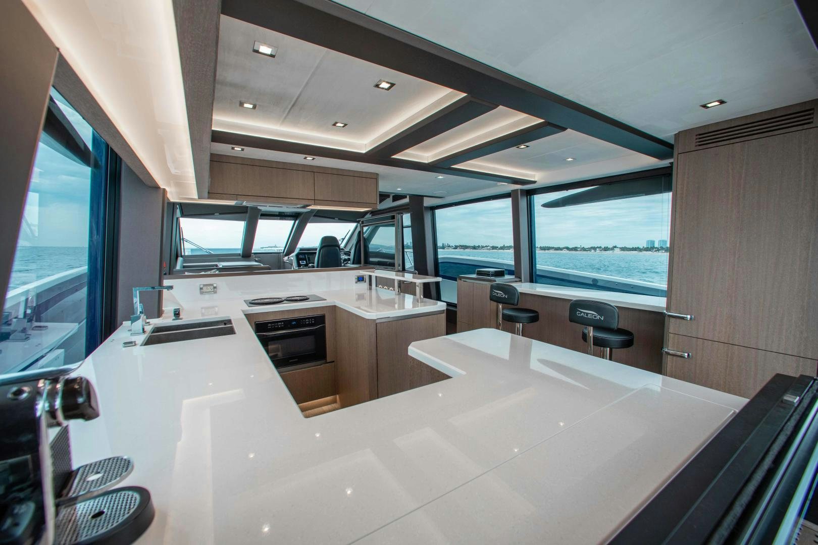 a large kitchen with a large window aboard LYLA BEE Yacht for Sale