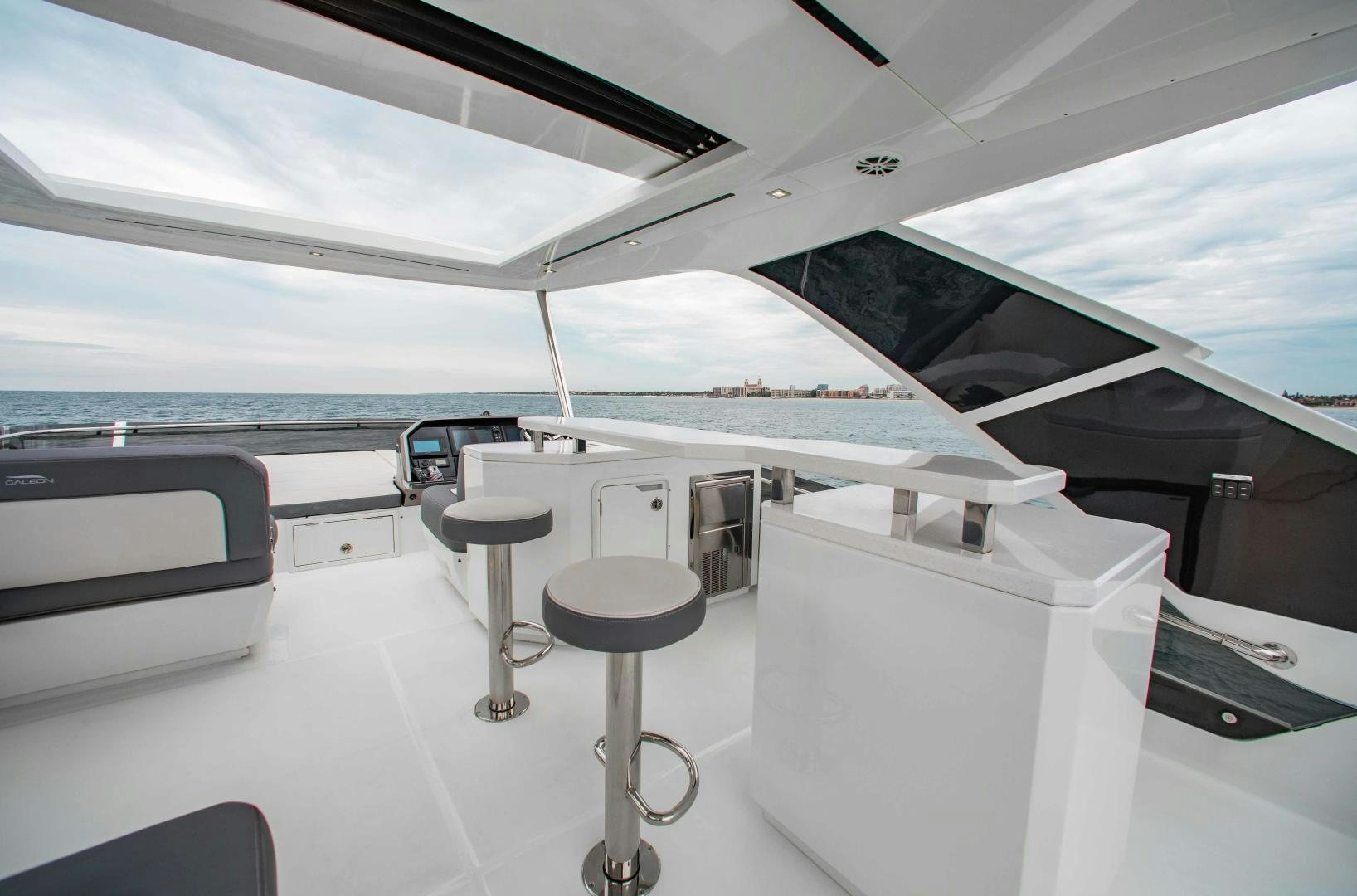 a room with a table and chairs aboard LYLA BEE Yacht for Sale