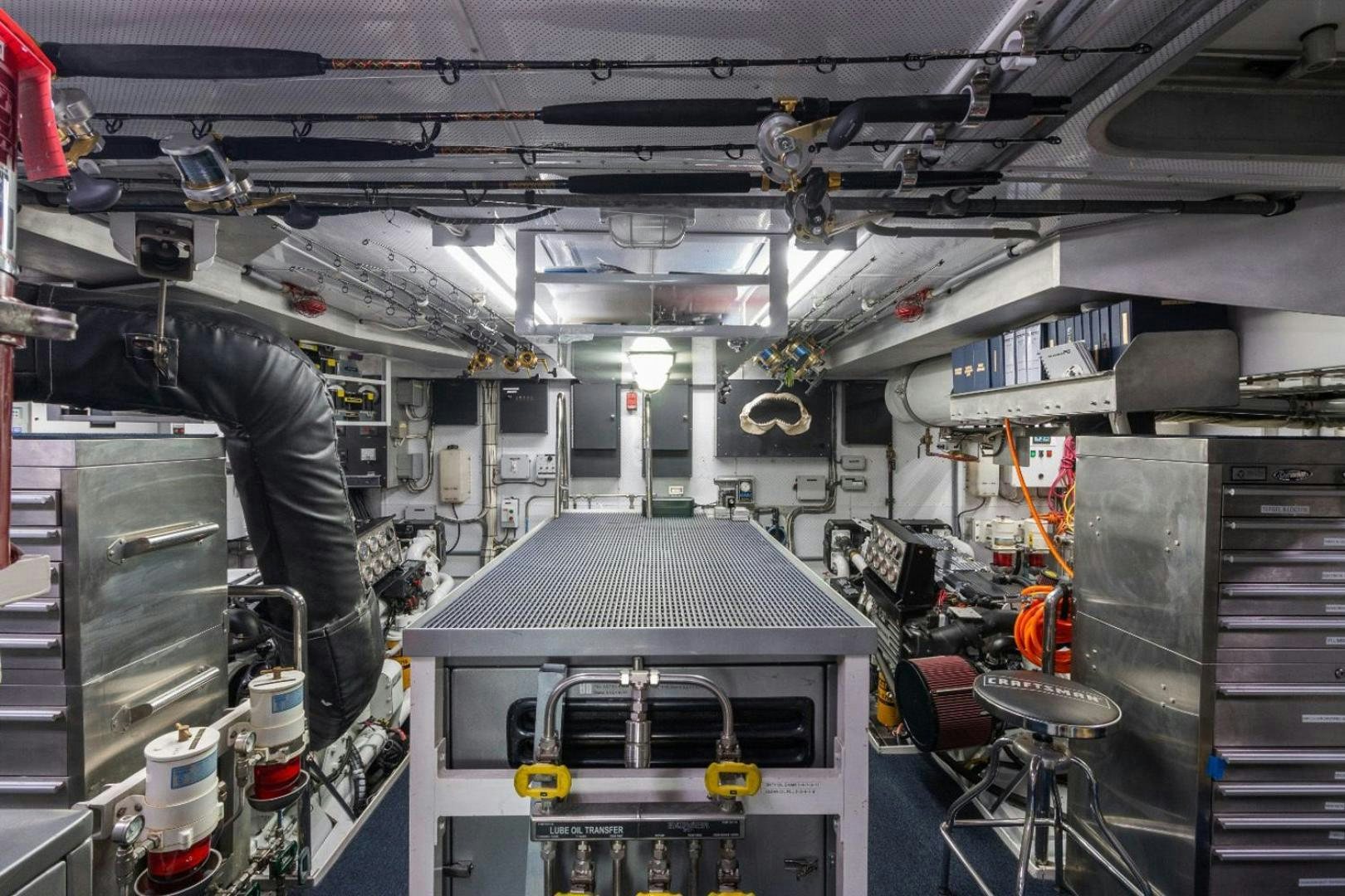 a person working in a factory aboard GITANA Yacht for Charter