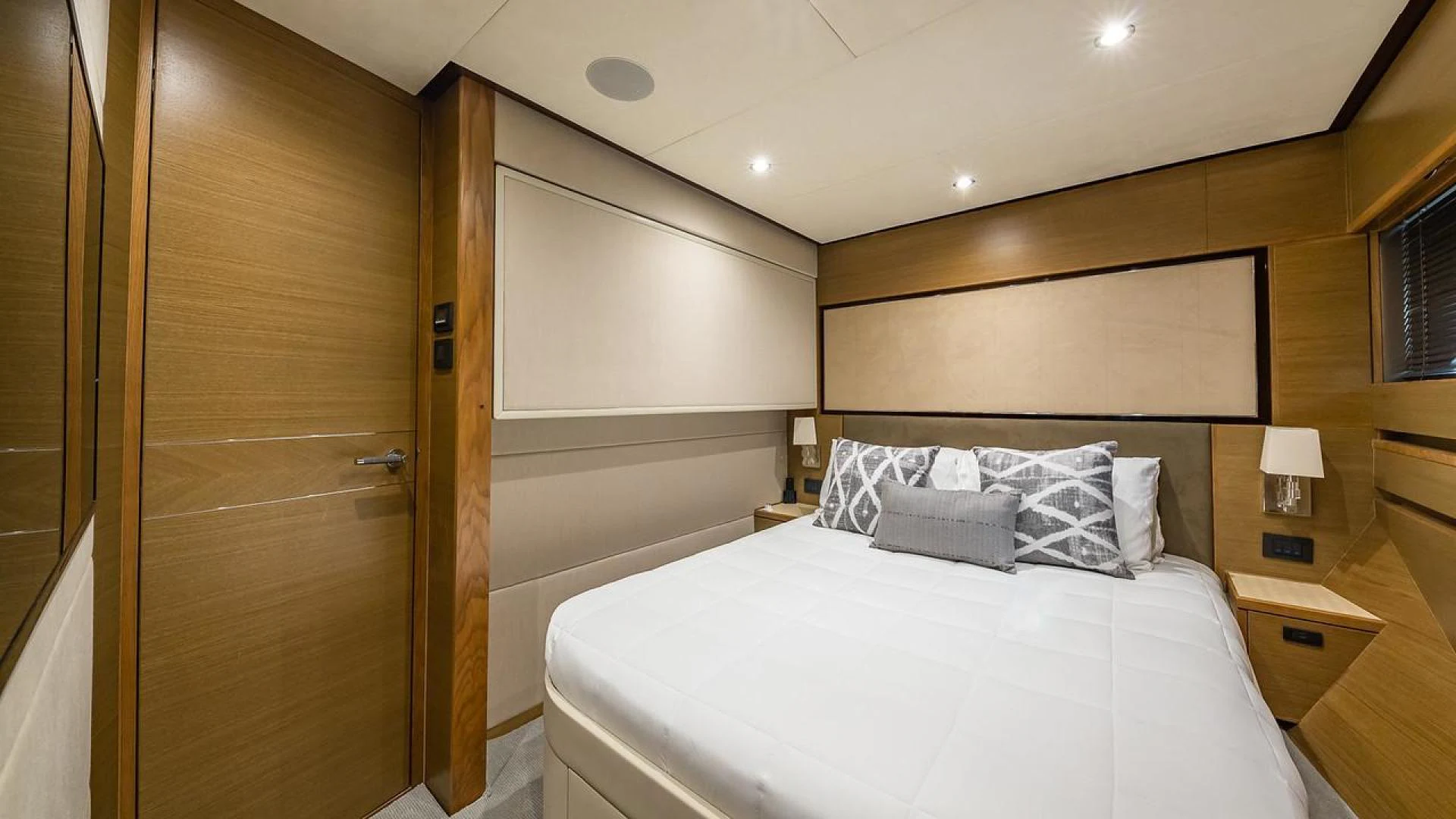 a bed in a room aboard FREEDOM Yacht for Sale