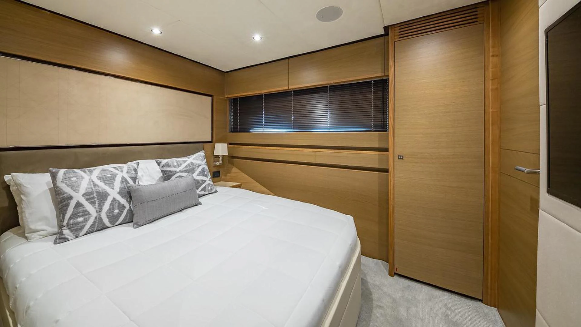 a bed in a room aboard FREEDOM Yacht for Sale