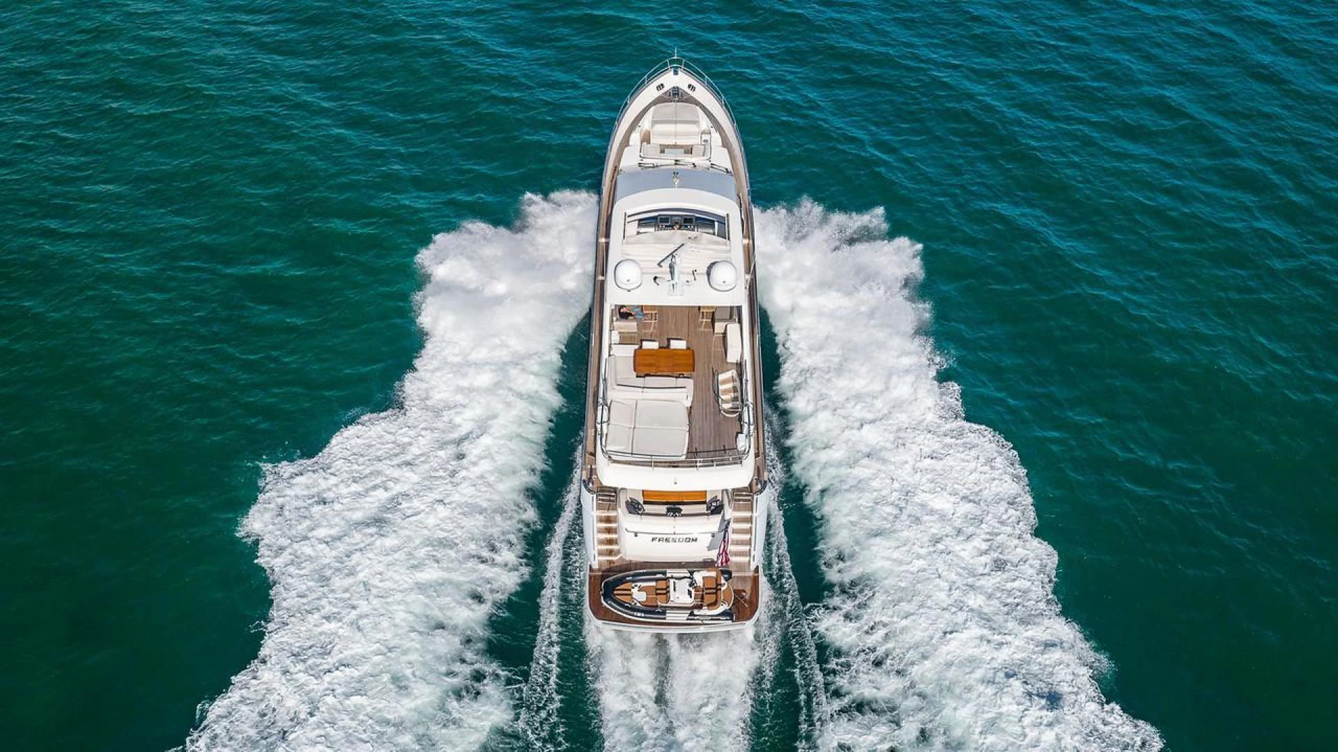 a boat on the water aboard FREEDOM Yacht for Sale