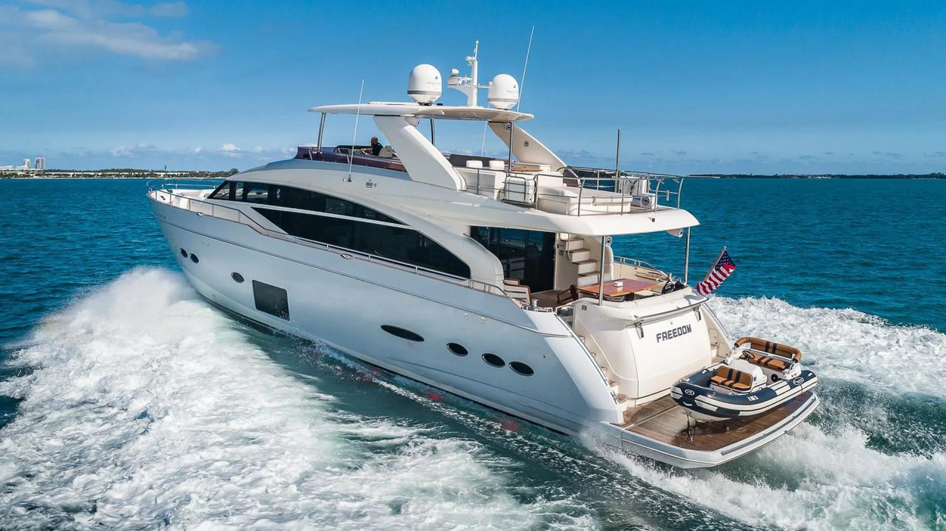 a boat on the water aboard FREEDOM Yacht for Sale