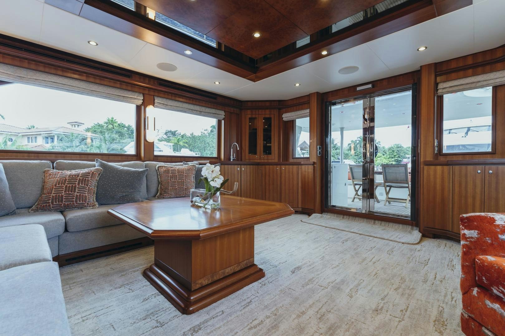 a living room with a couch and a coffee table aboard SKULLDUGGERY Yacht for Sale