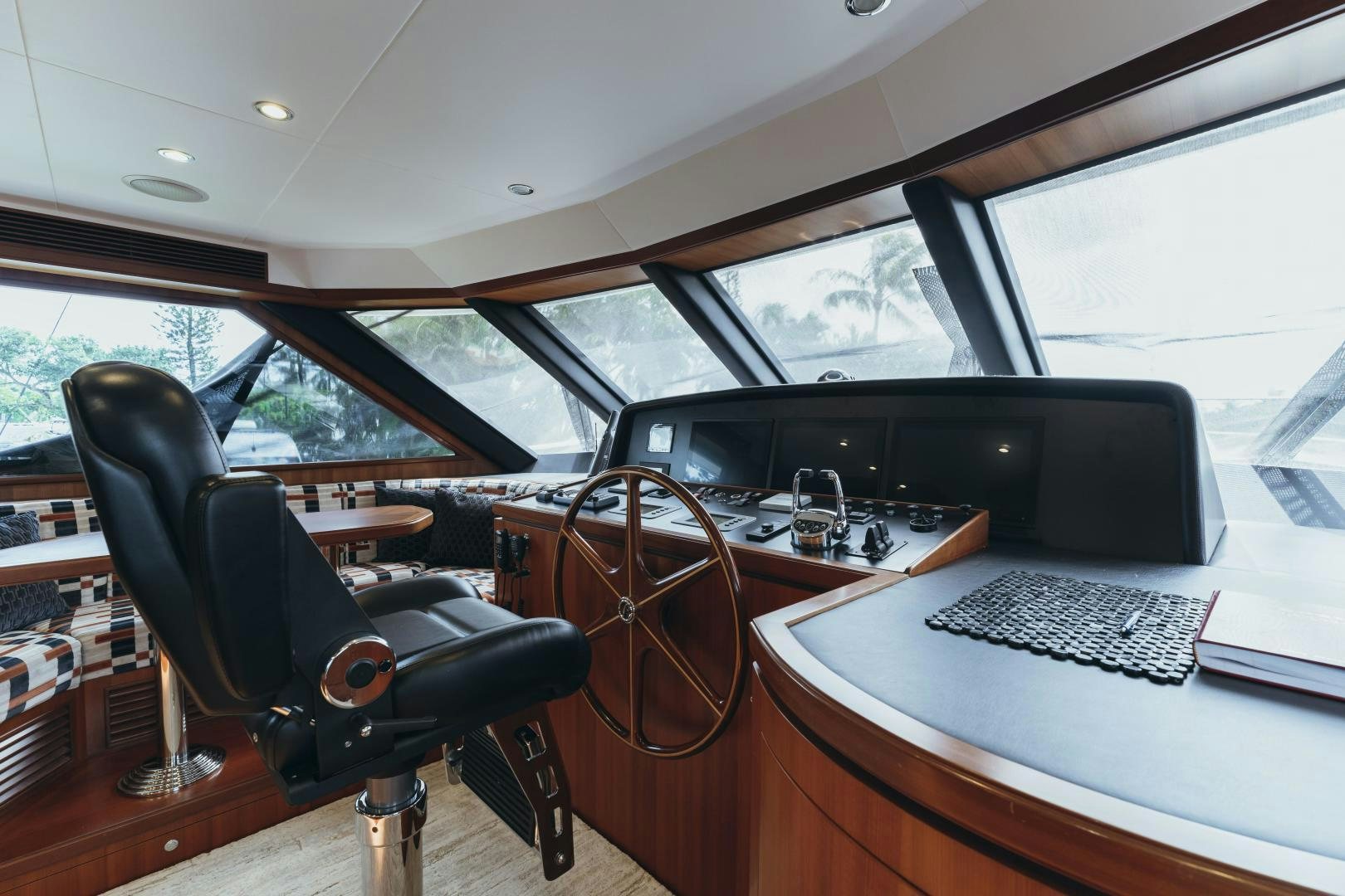 a car with a desk and a computer on it aboard SKULLDUGGERY Yacht for Sale