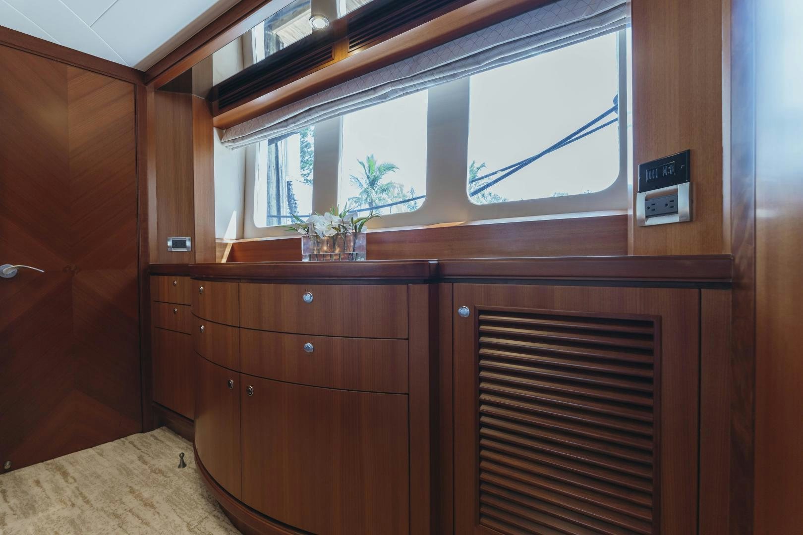 a room with wooden cabinets aboard SKULLDUGGERY Yacht for Sale