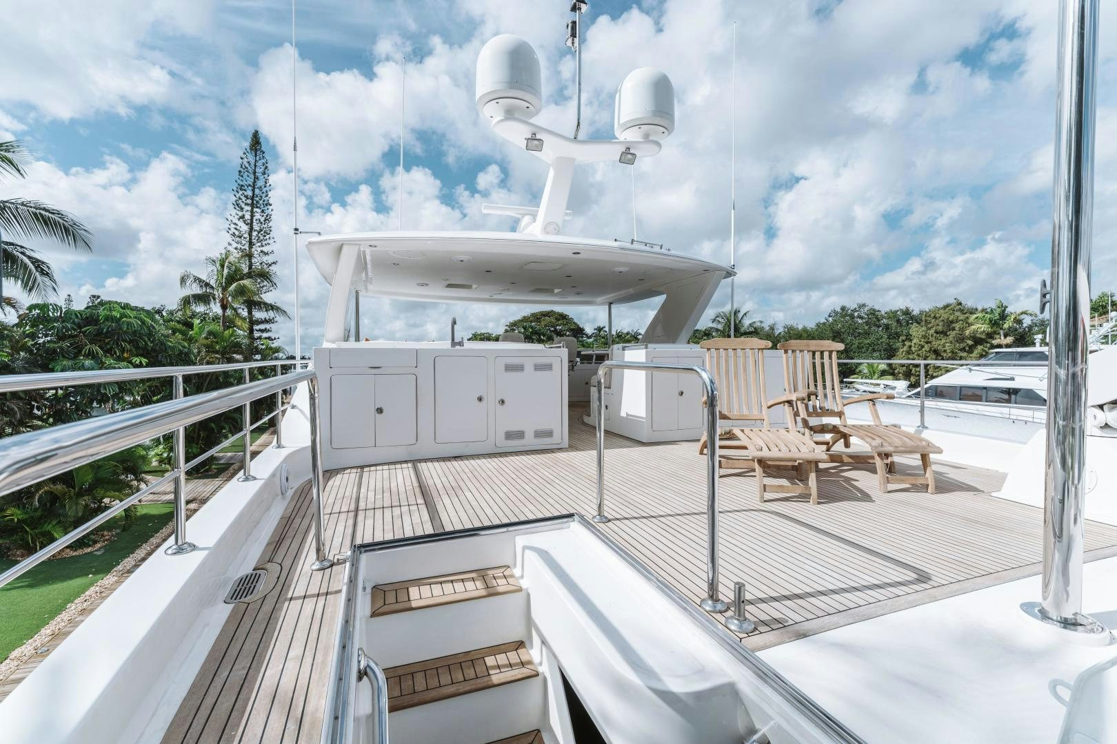 a large white building with a satellite dish on top aboard SKULLDUGGERY Yacht for Sale