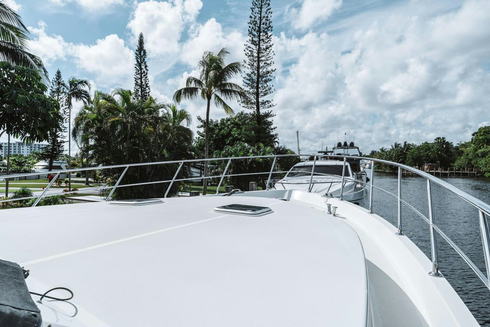 a tennis court with trees aboard SKULLDUGGERY Yacht for Sale