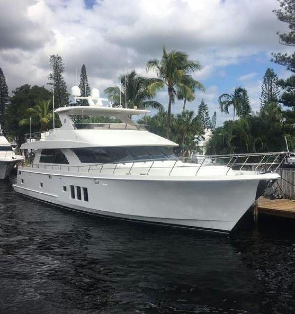 a white boat in a body of water aboard SKULLDUGGERY Yacht for Sale
