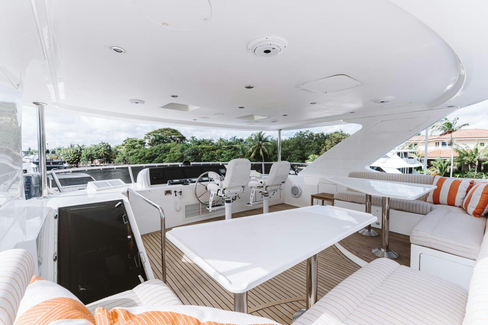 a room with a table and chairs aboard SKULLDUGGERY Yacht for Sale
