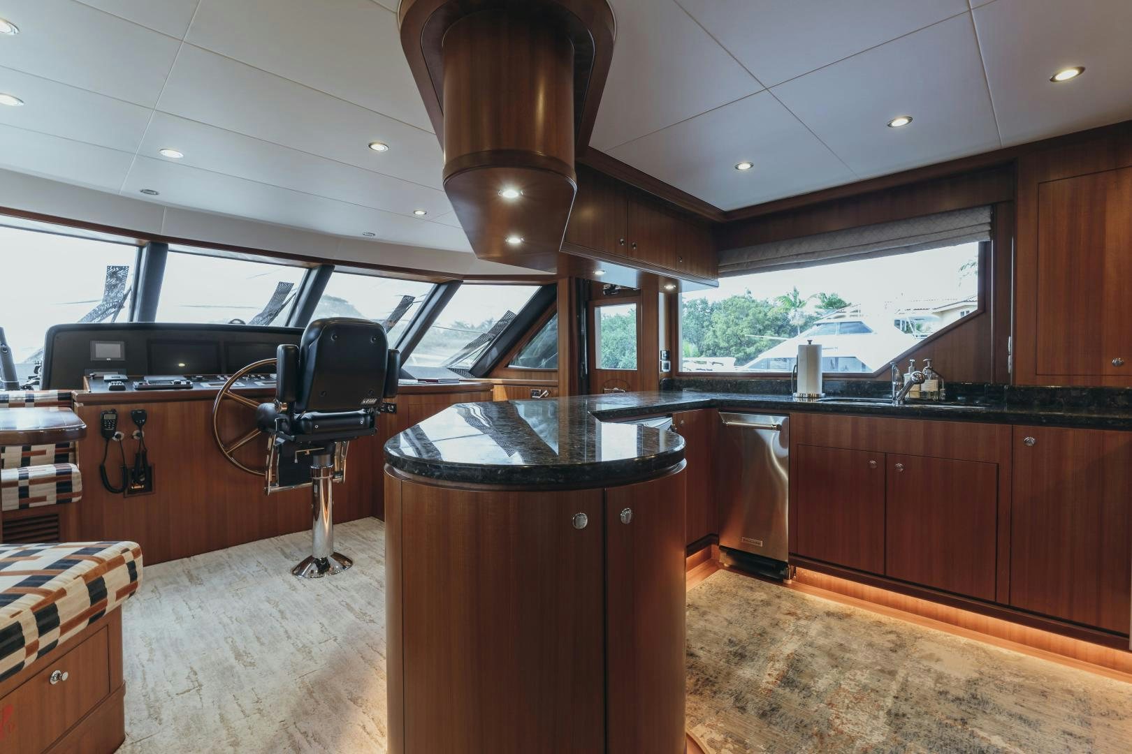 a room with a desk and a chair aboard SKULLDUGGERY Yacht for Sale