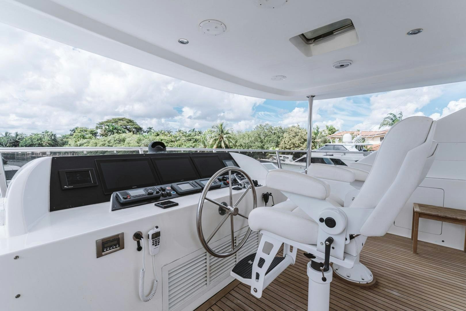 a white chair on a deck aboard SKULLDUGGERY Yacht for Sale