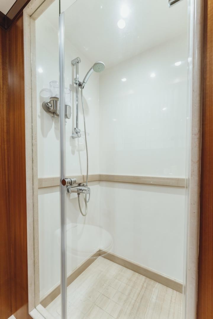a shower with a glass door aboard SKULLDUGGERY Yacht for Sale